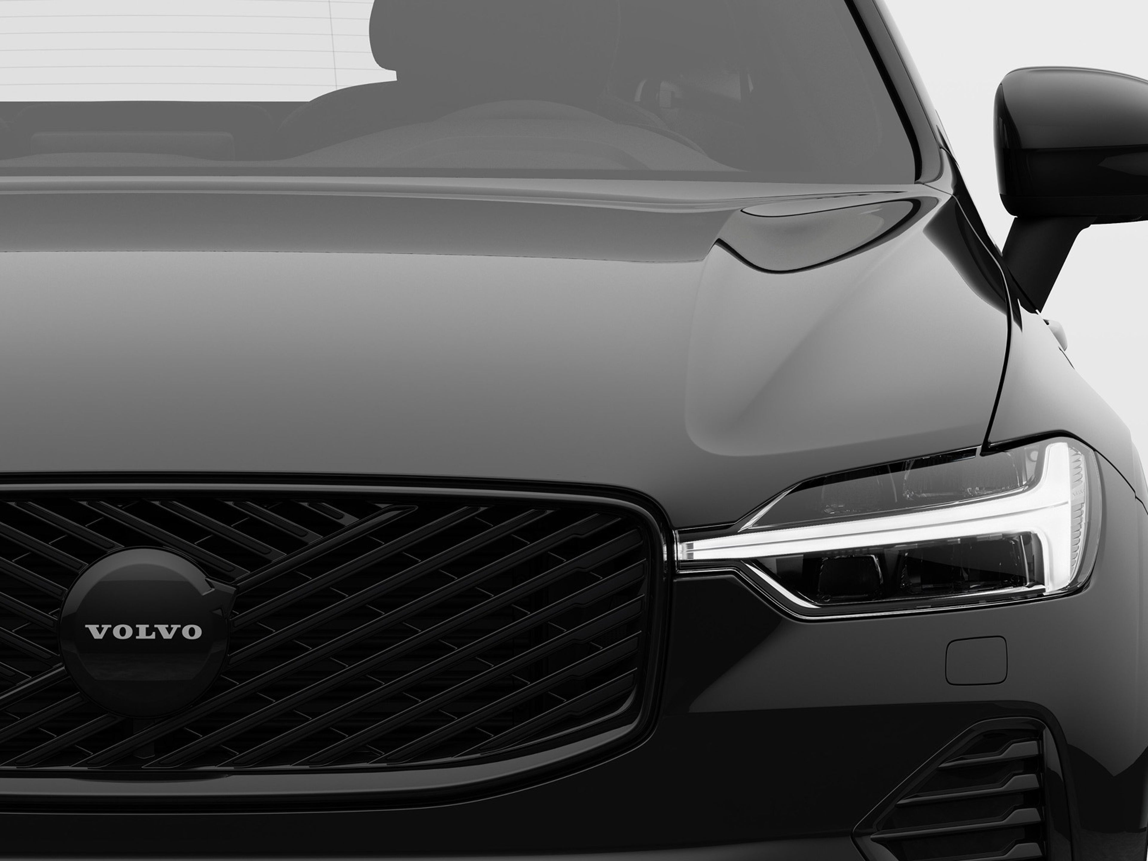 Volvo XC60 Black Nordic Edition. Bilden tagen framifrån, inzoomad på grillen.