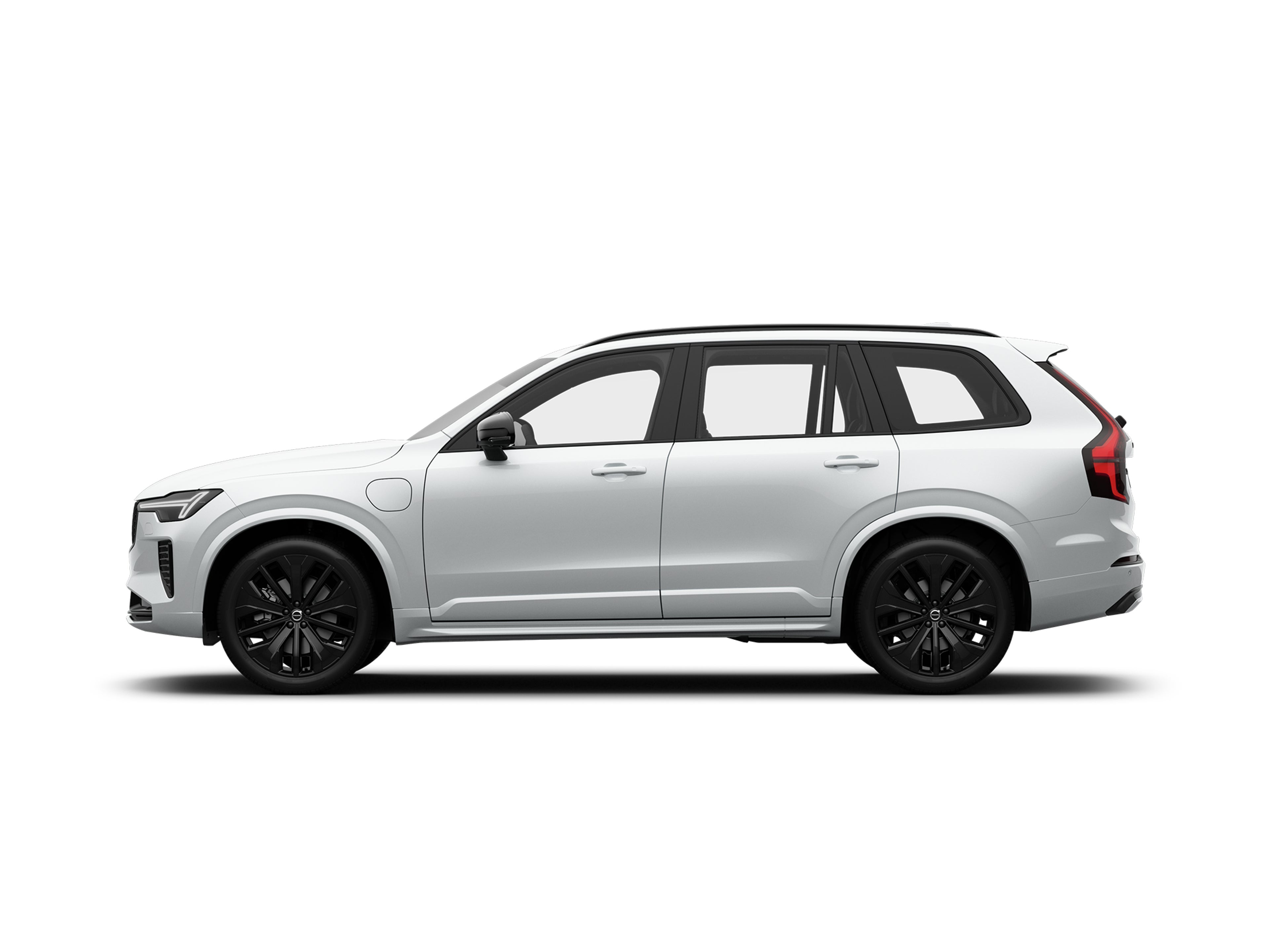 Seitliche Ansicht eines Volvo XC60 Black Edition Plug-in Hybrid in Crystal White