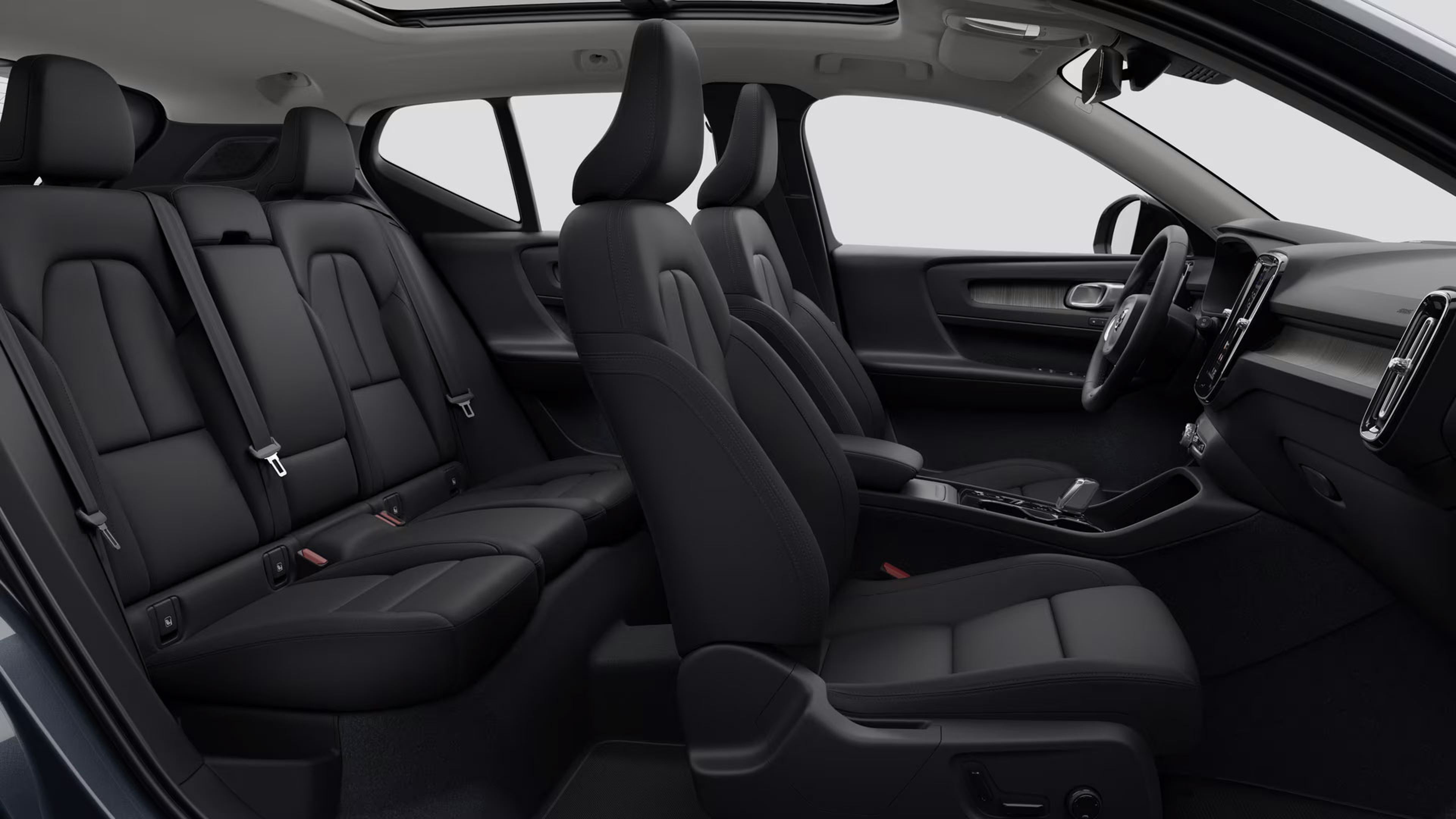 Intérieur de voiture moderne avec sièges en cuir noir, rangées avant et arrière, toit ouvrant et tableau de bord