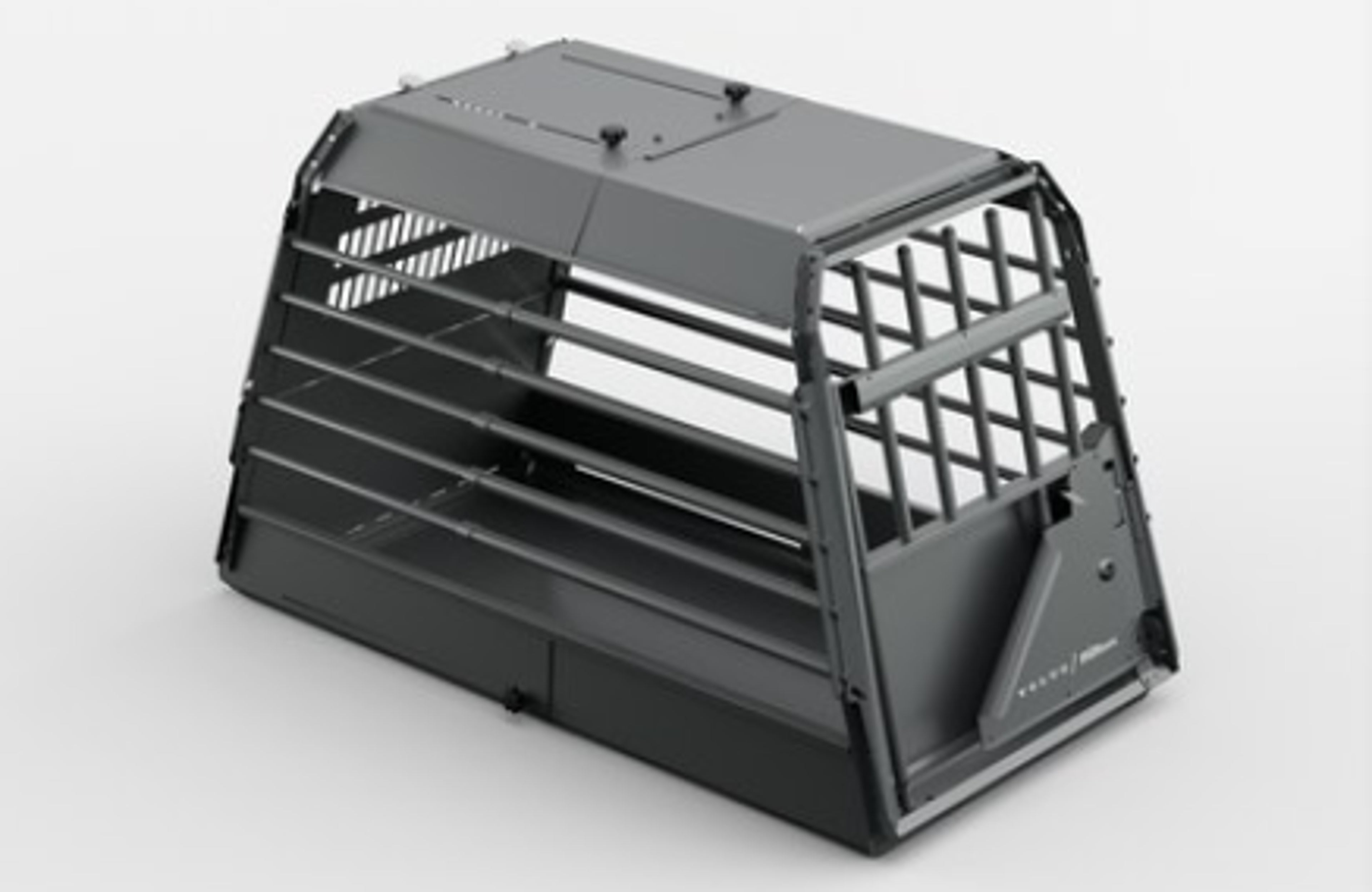 Hund i hundbur i en Volvo EX90.