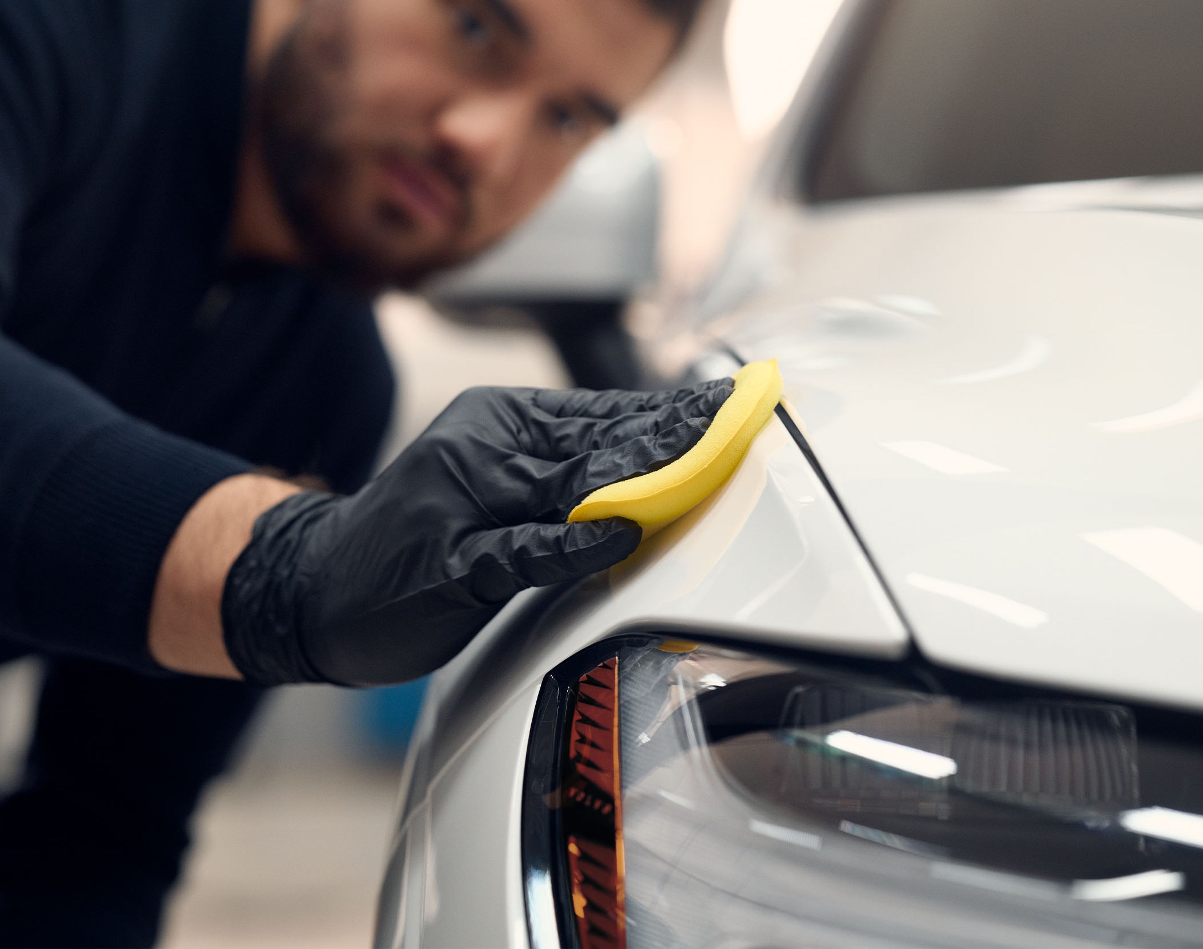 Certified-Collision - technician polishing car