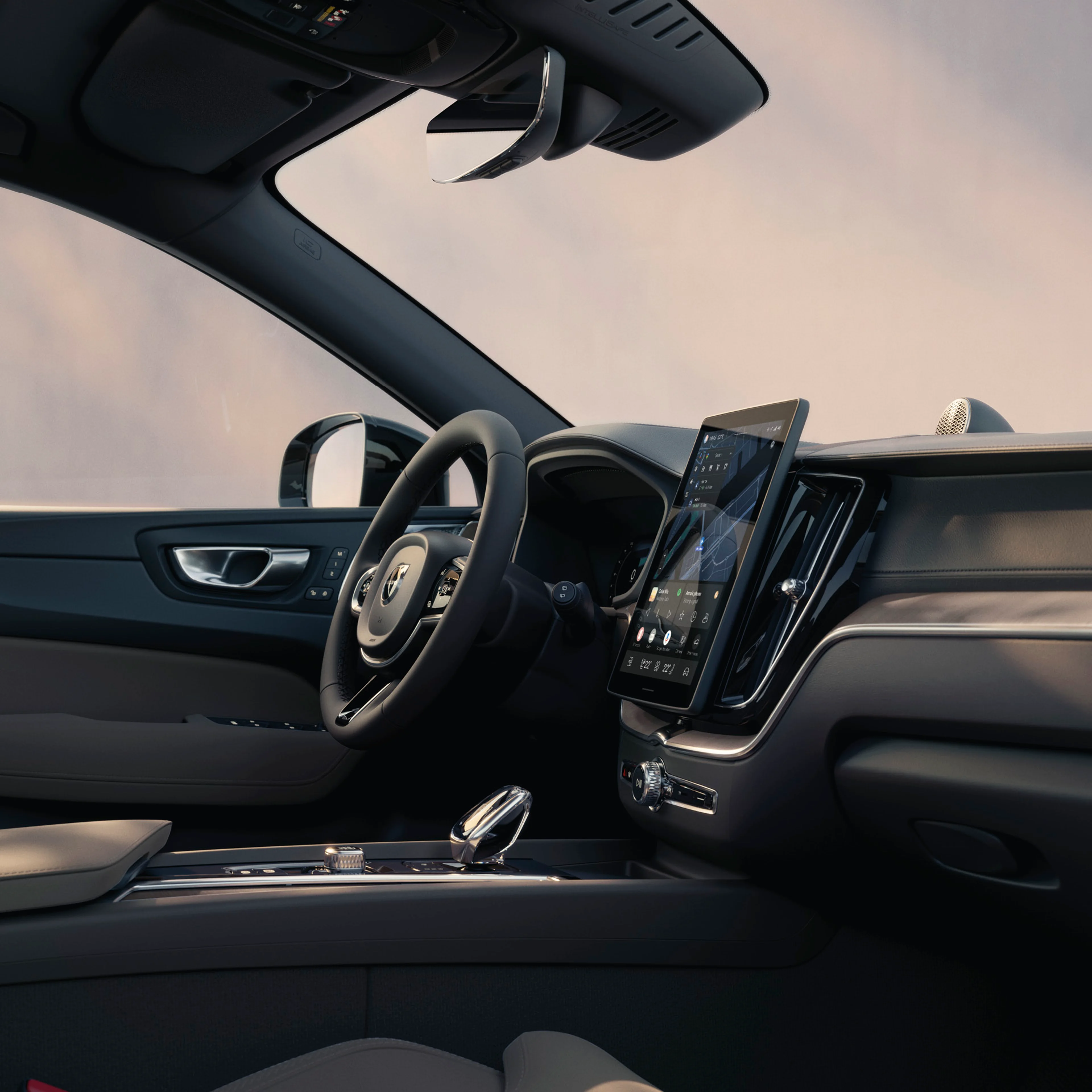 Wnętrzne Volvo XC60 pokażujące kokpit i kierownicę