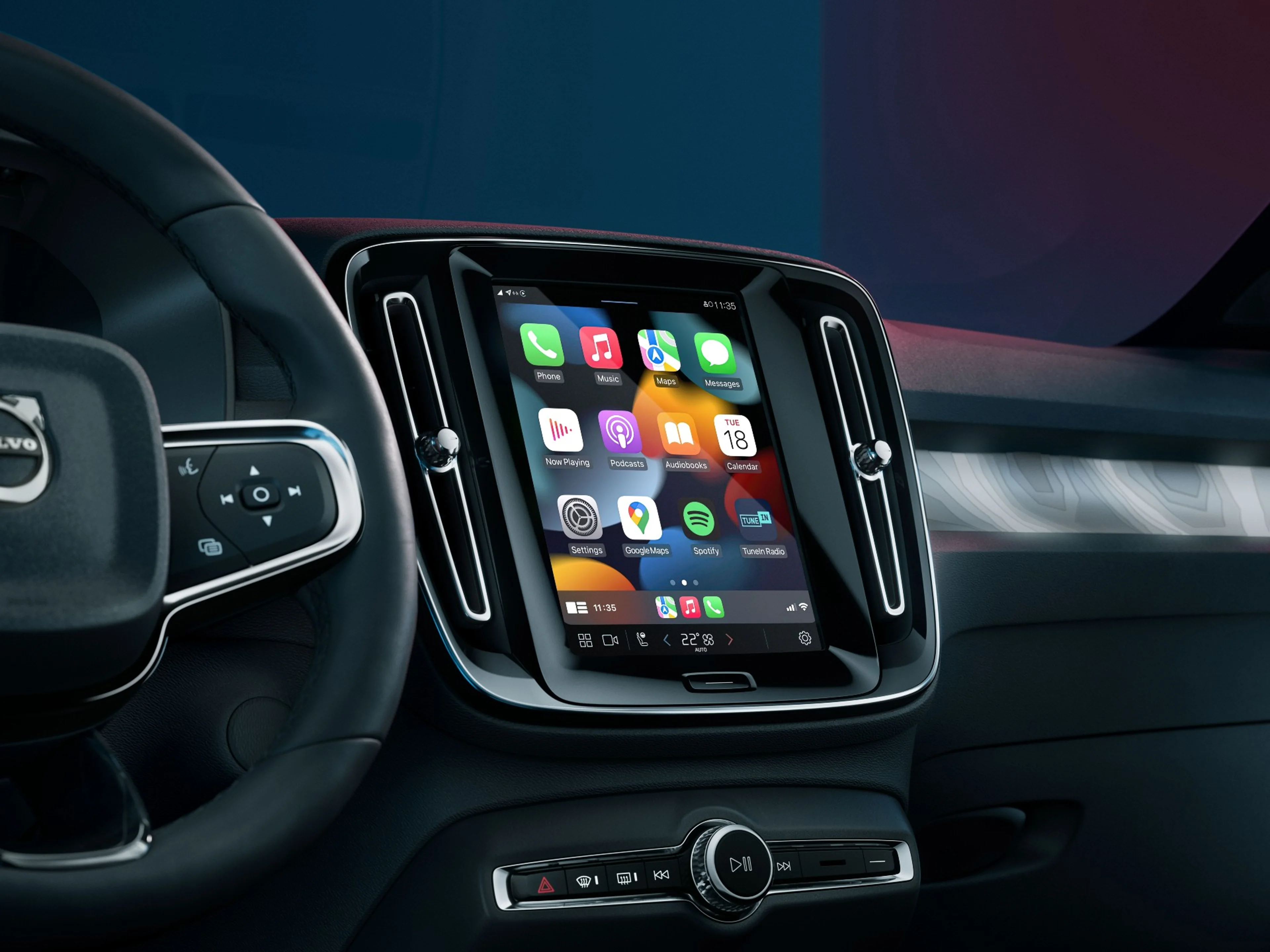 Tela central do painel de um Volvo exibindo o menu inicial do Car Play
