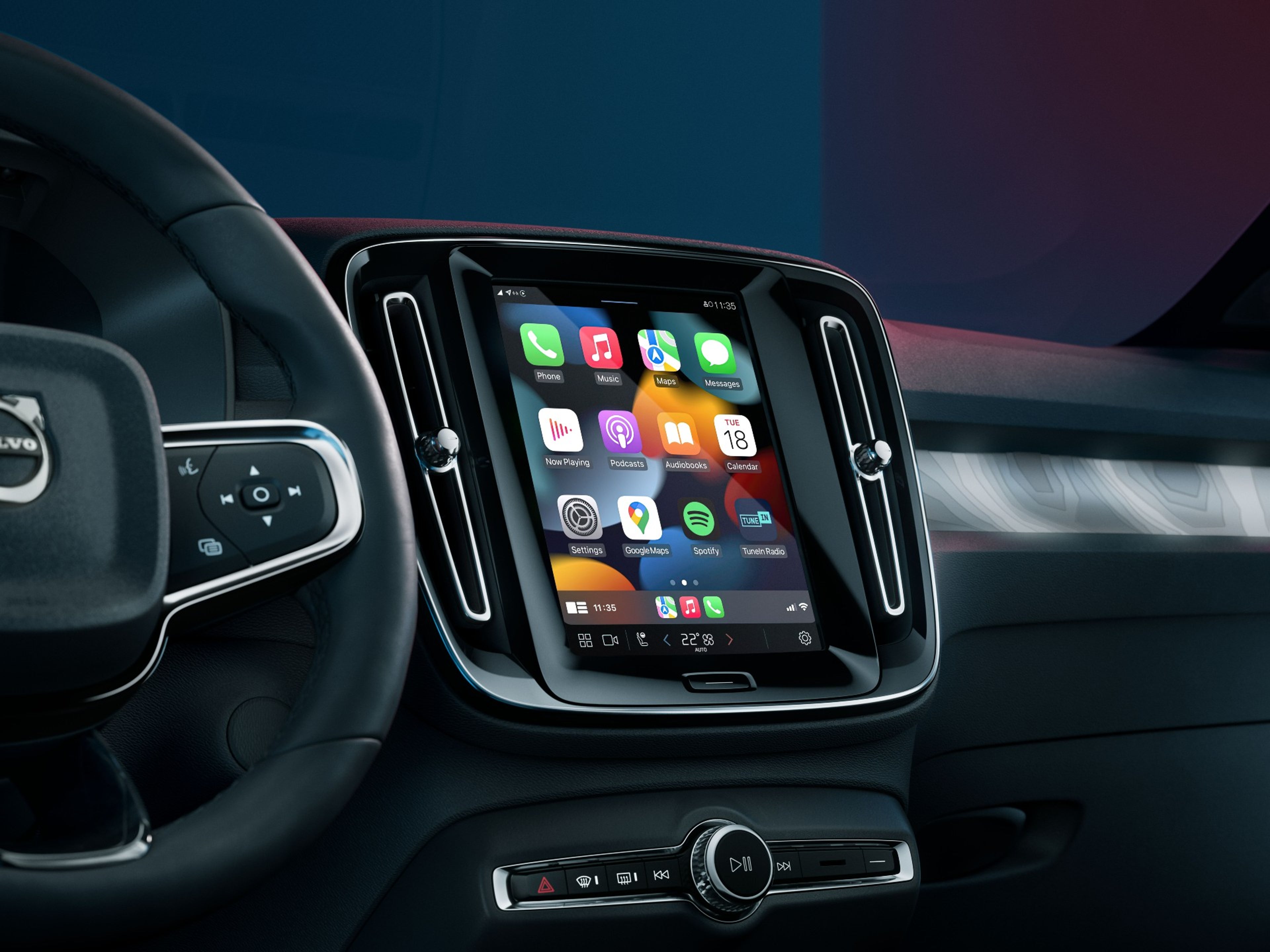 Tela central do painel de um Volvo exibindo o menu inicial do Car Play