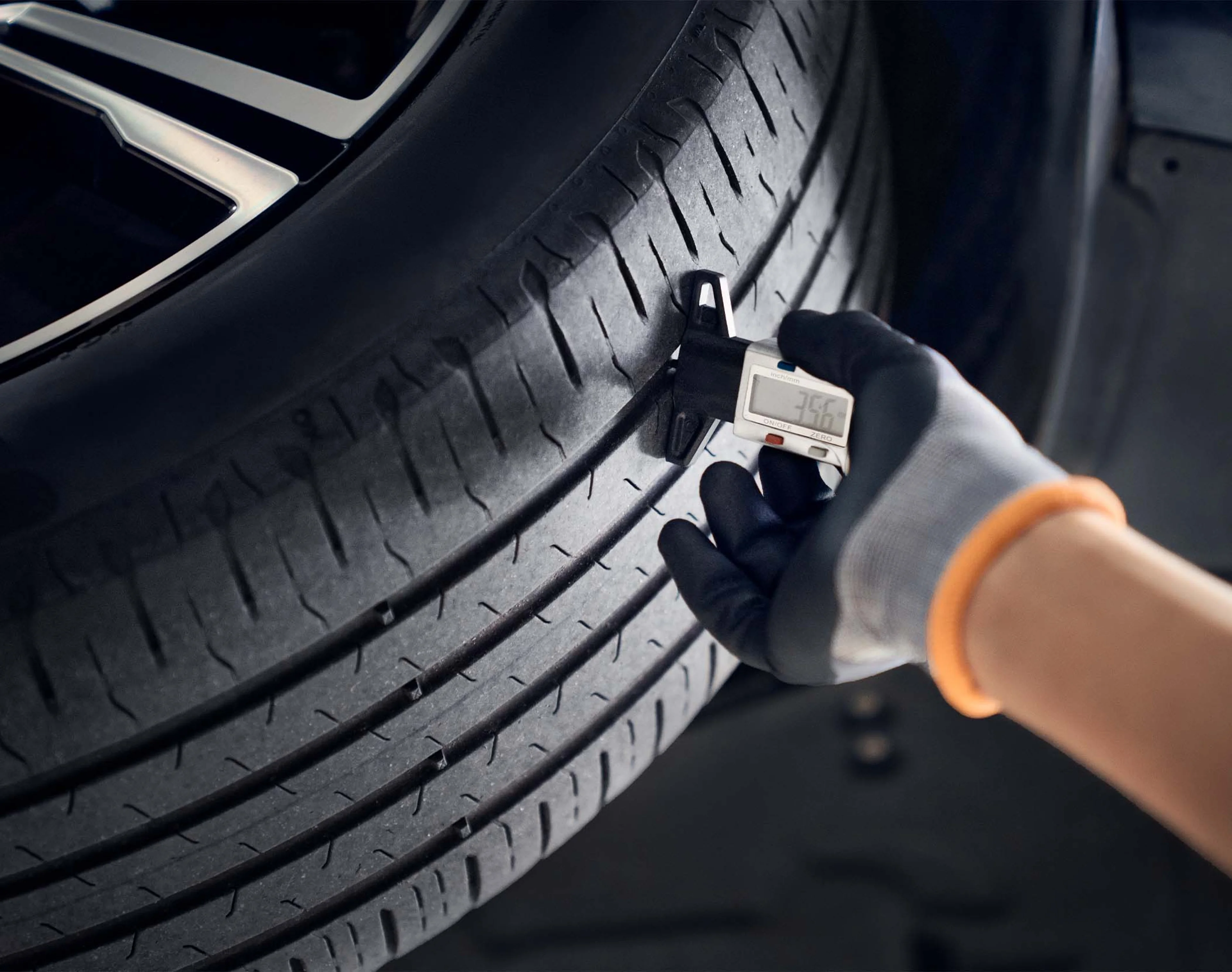 The Best Tires for a Volvo - checking tire on a car