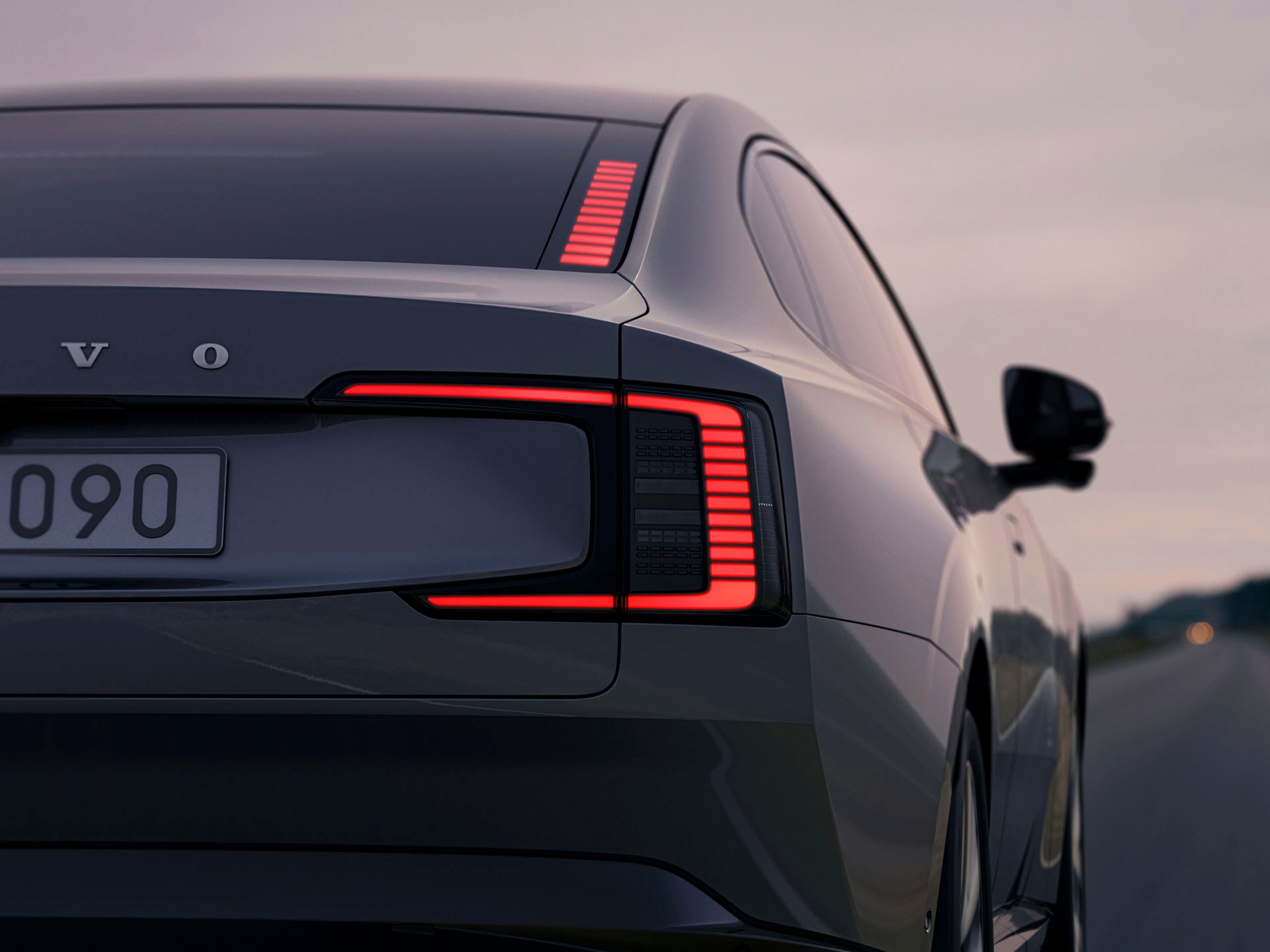 Parte trasera de un Volvo ES90 destacando sus faros y luces LED