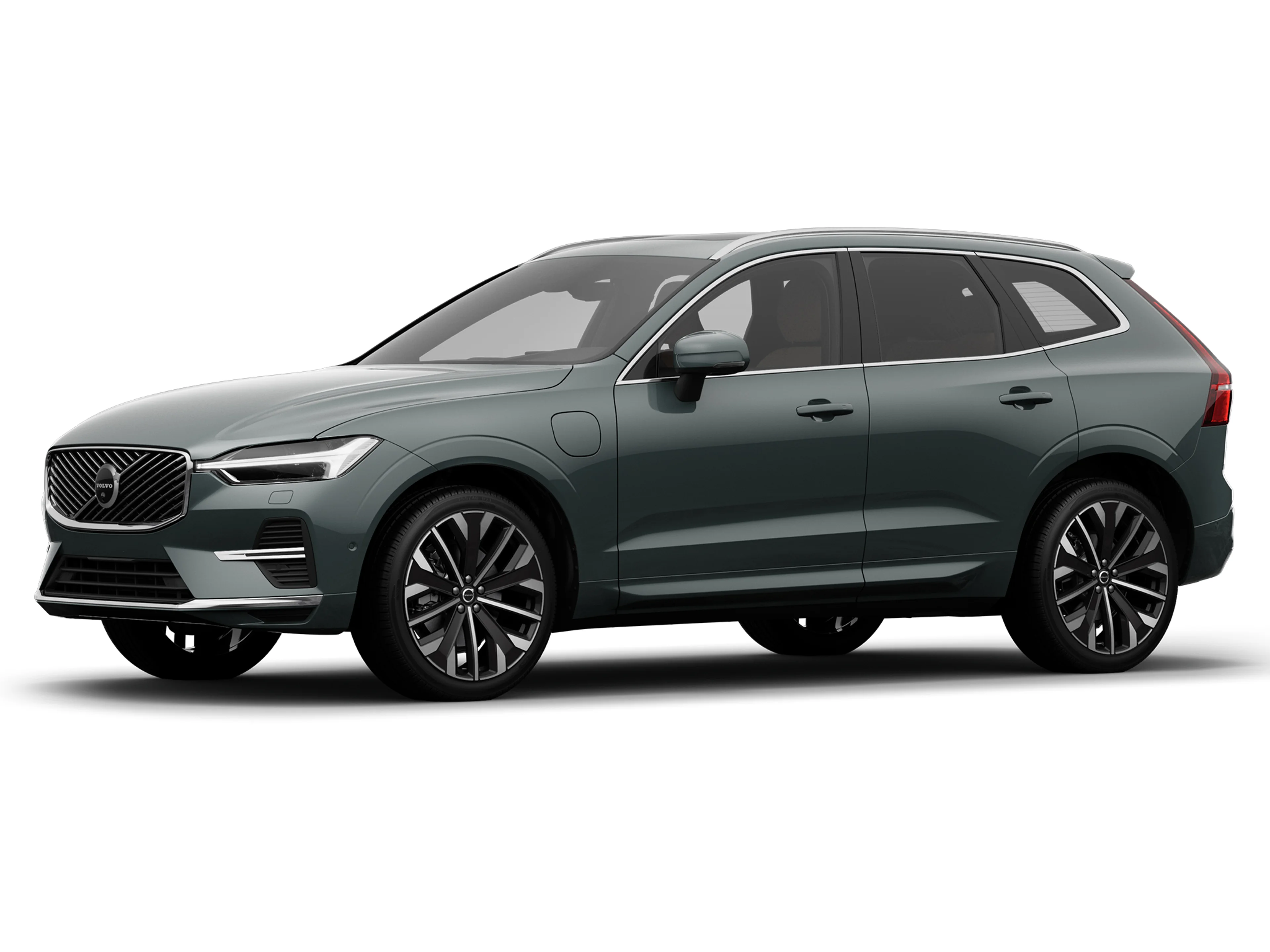 Forest Lake -värinen Volvo XC60 lataushybridiauto Bright yksityiskohdilla ja 21" vanteilla.