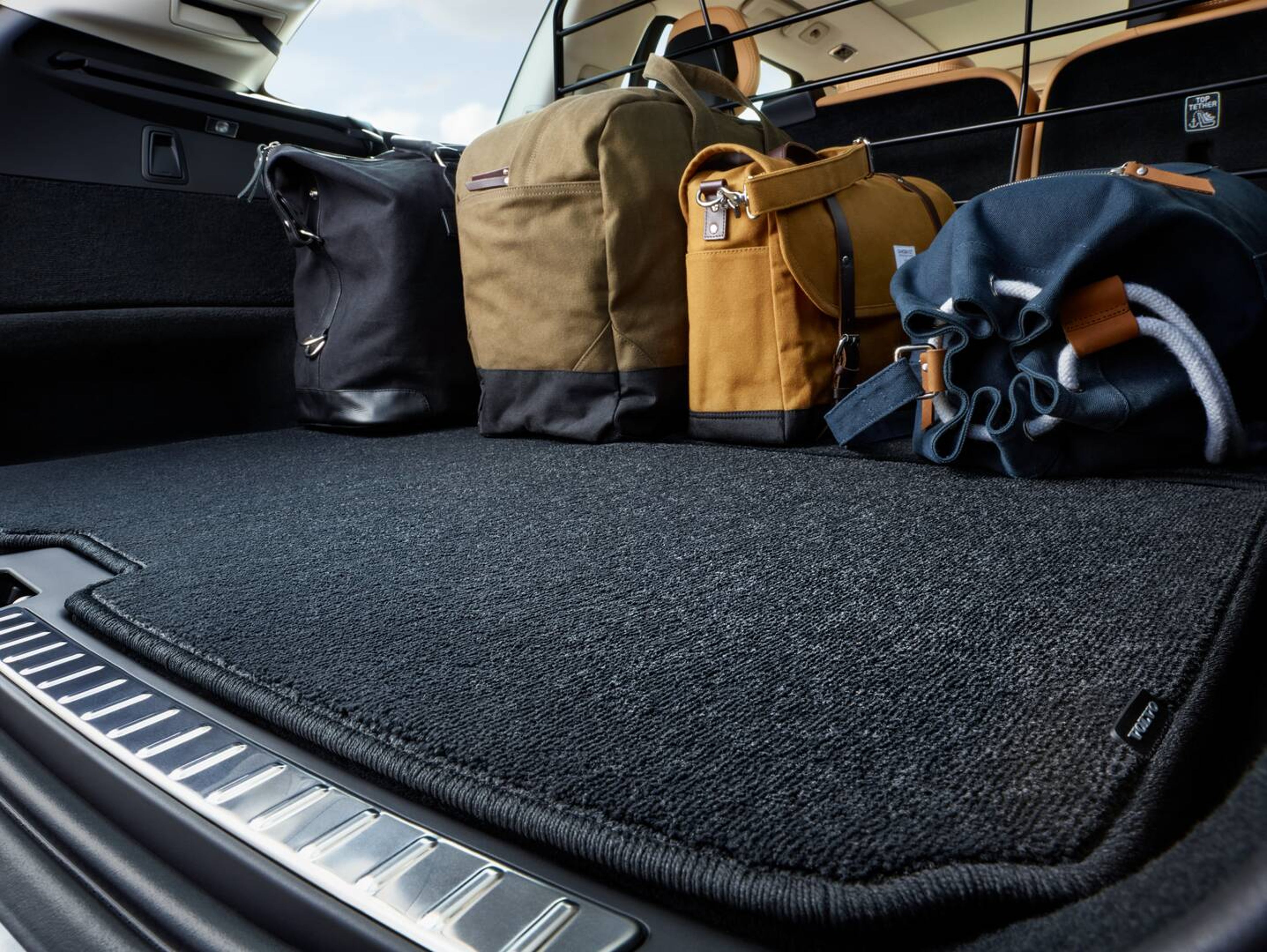 Volvo charcoal colour floor mat in the boot of a Volvo car