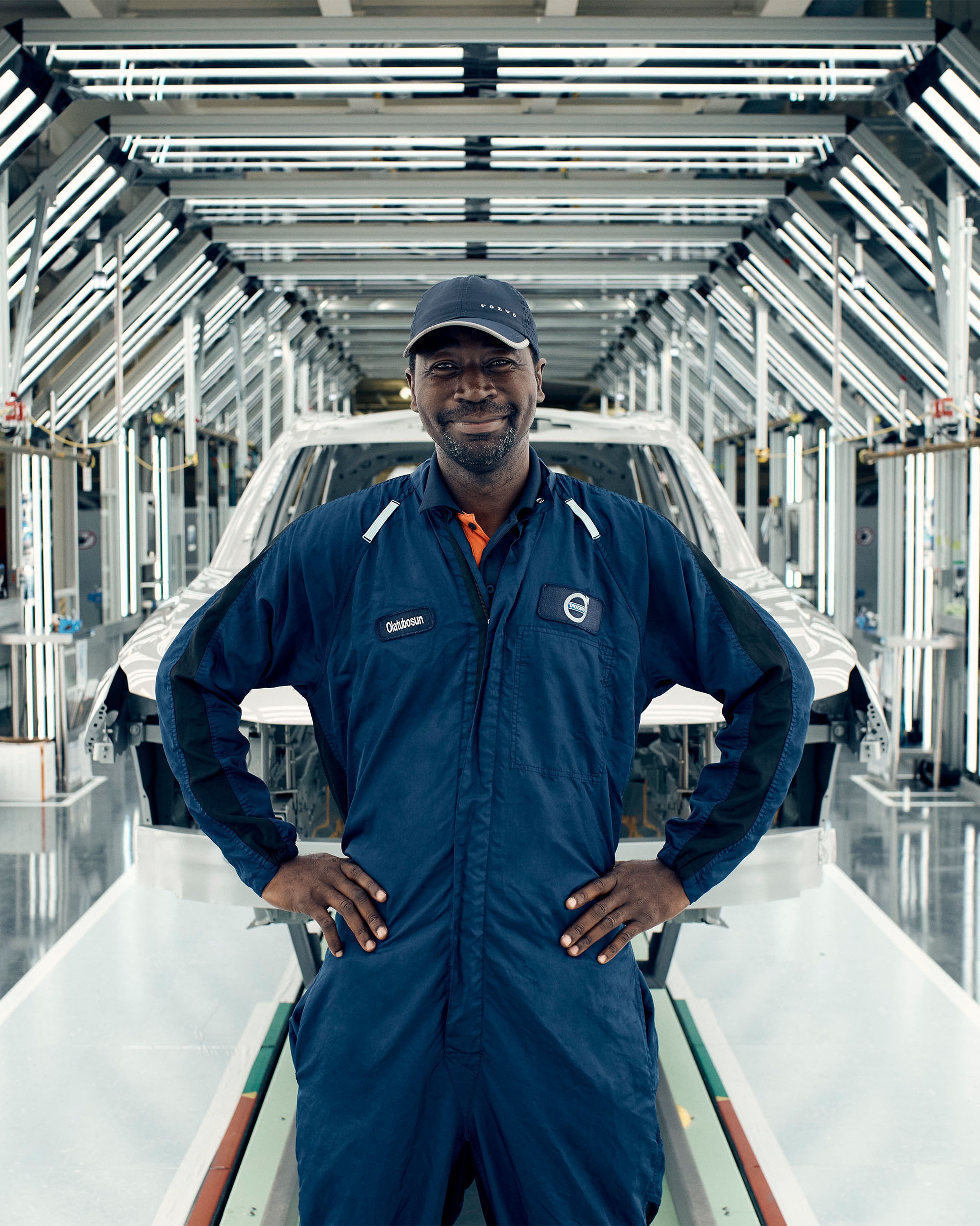 Volvo Made by Us - Technician stands in front of car