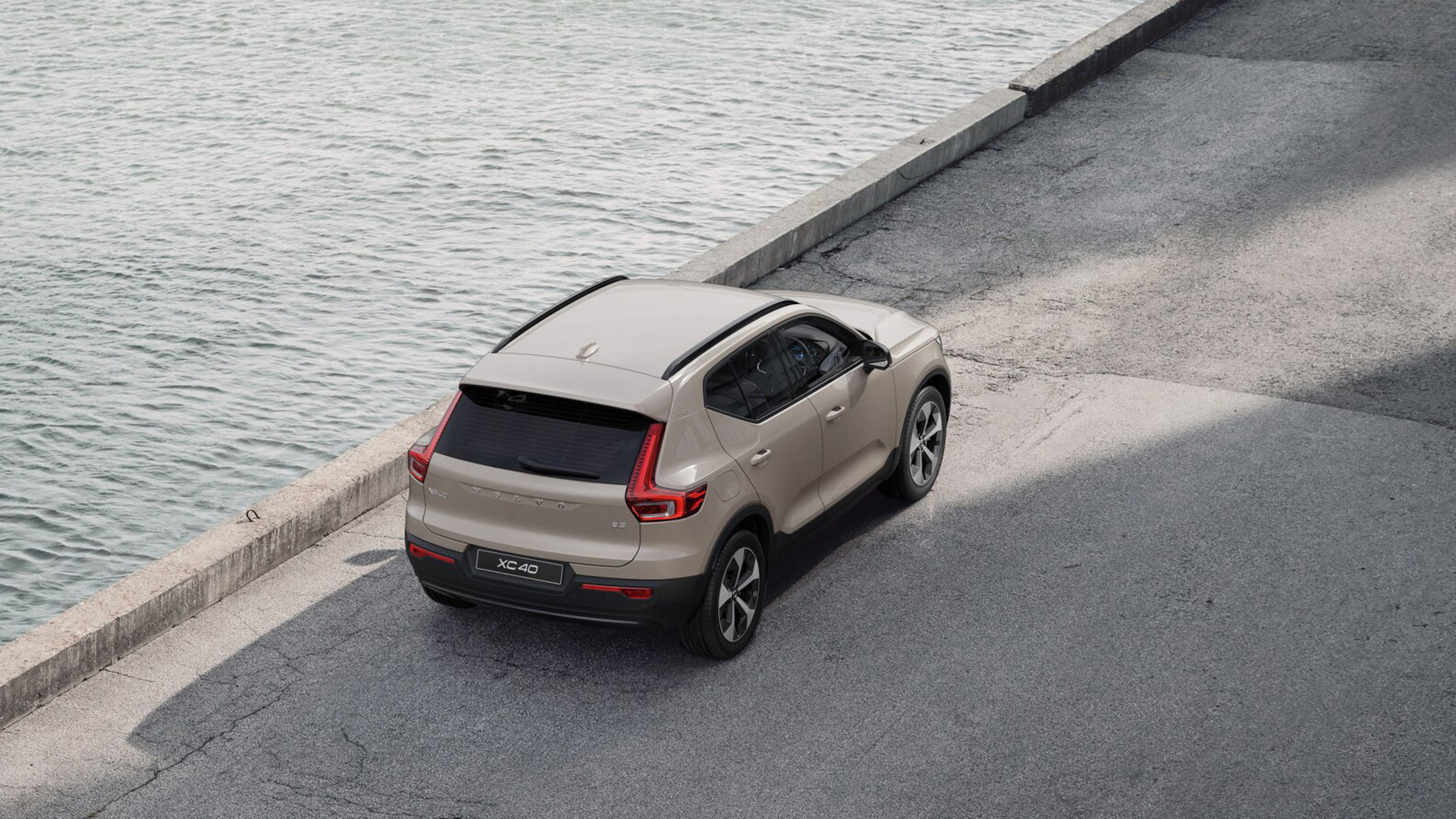 XC40 parked on the bank of a river