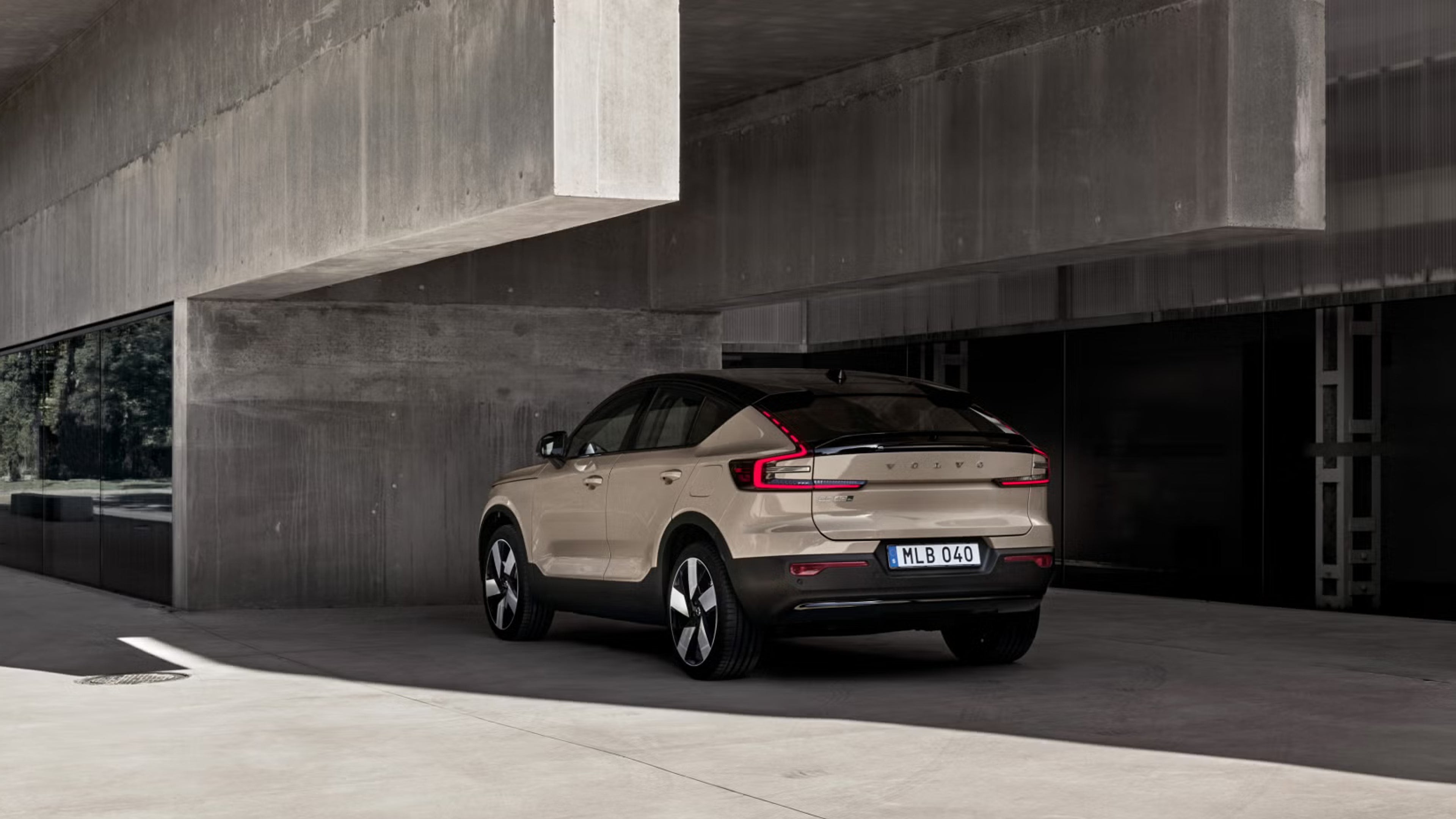 EC40 parked in concrete undercroft of grey building on a sunny day