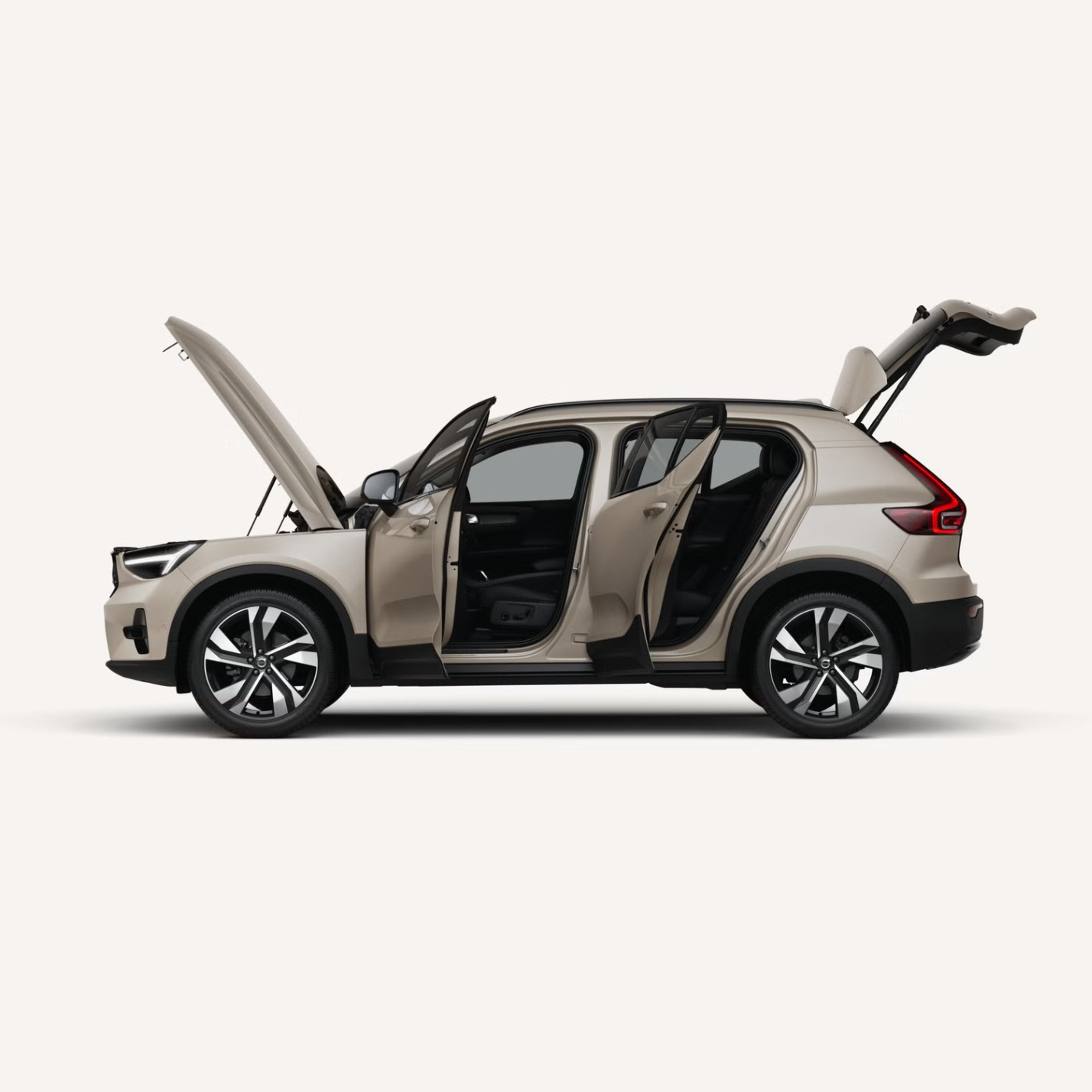 Side view of XC40 with all doors open to show the scale of the interior.