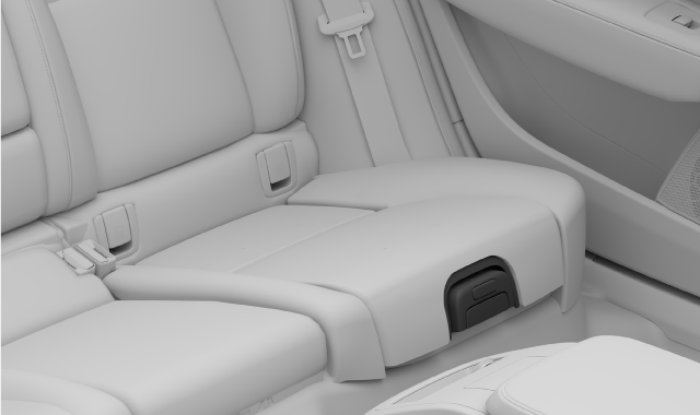 The release handle on the front of the centre seat