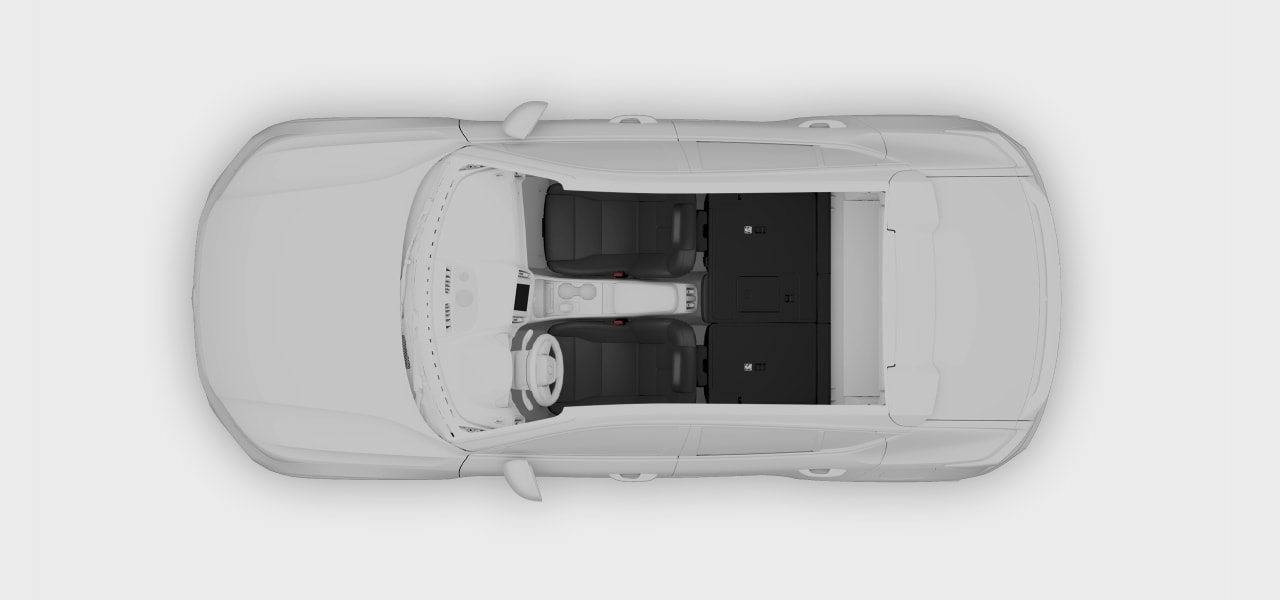 A top-down view of the vehicle with folded rear seats