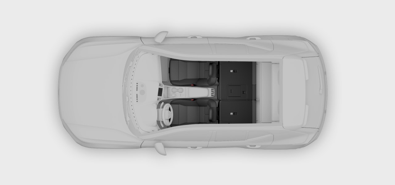 A top-down view of the car with folded rear seats