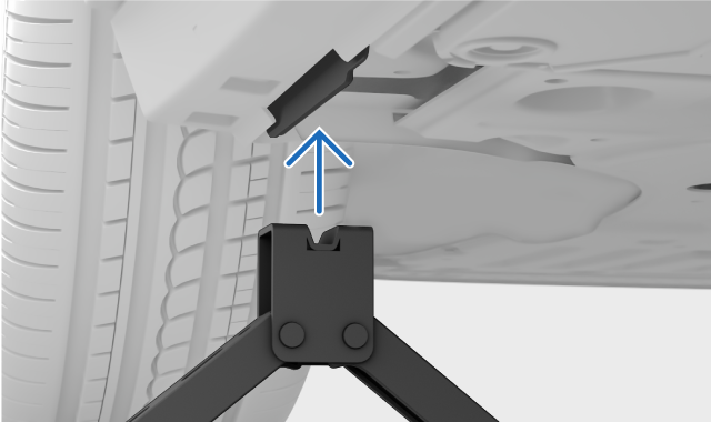 The head of the jack meeting the jacking point.