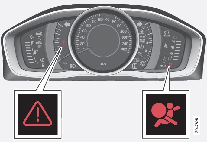 Gevarendriehoek en waarschuwingssymbool voor het airbagsysteemairbagsysteem  op een analoog instrumentenpaneel.