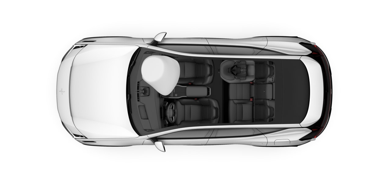 Vue de dessus de l'habitacle d'une voiture avec un coussin gonflable déployé et un dispositif de retenue pour enfant à l'arrière.
