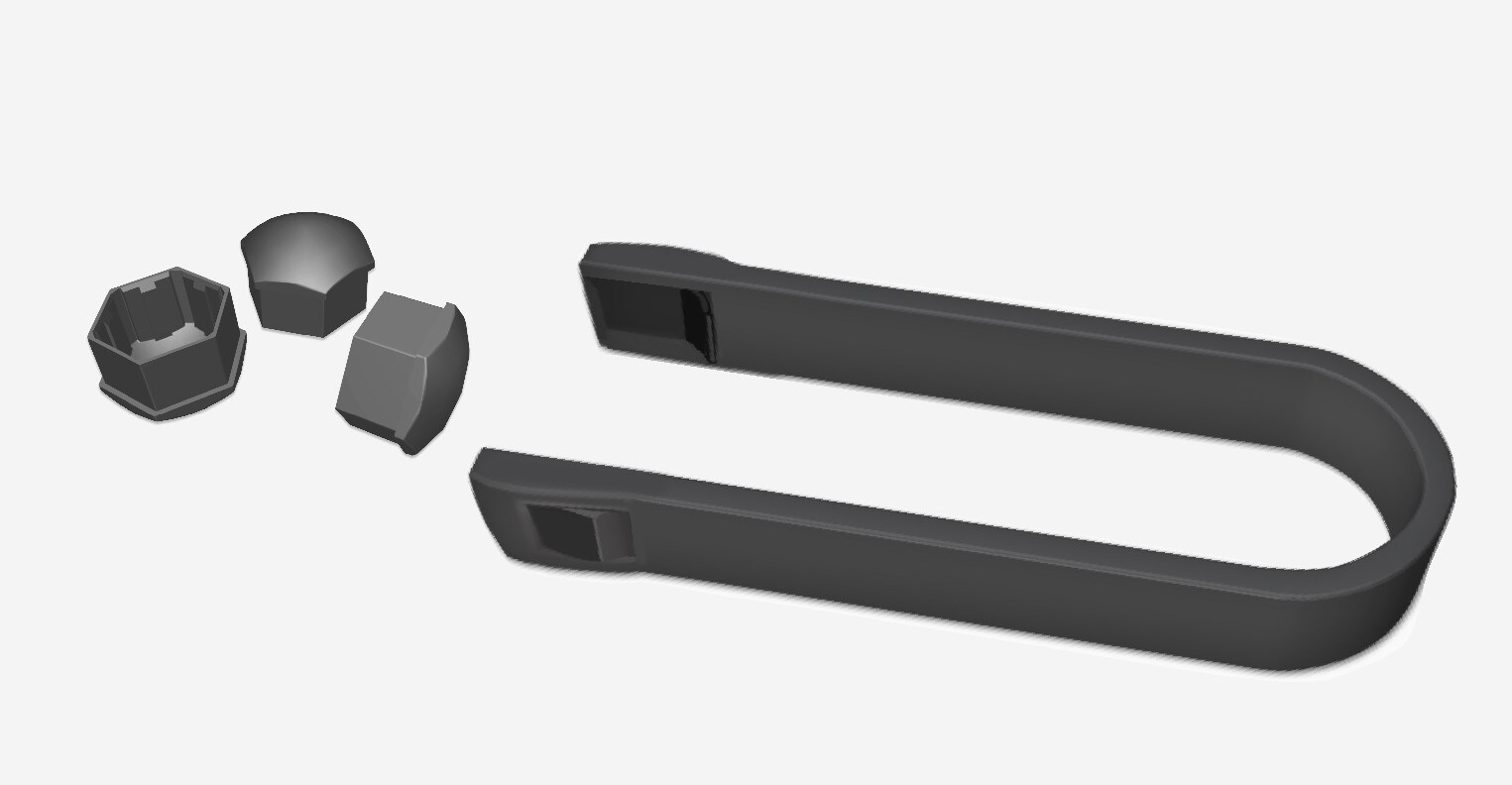 Tool for removing the plastic caps on the wheel bolts.