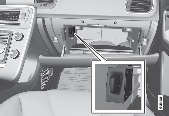 Holder for SIM card in the glove box.