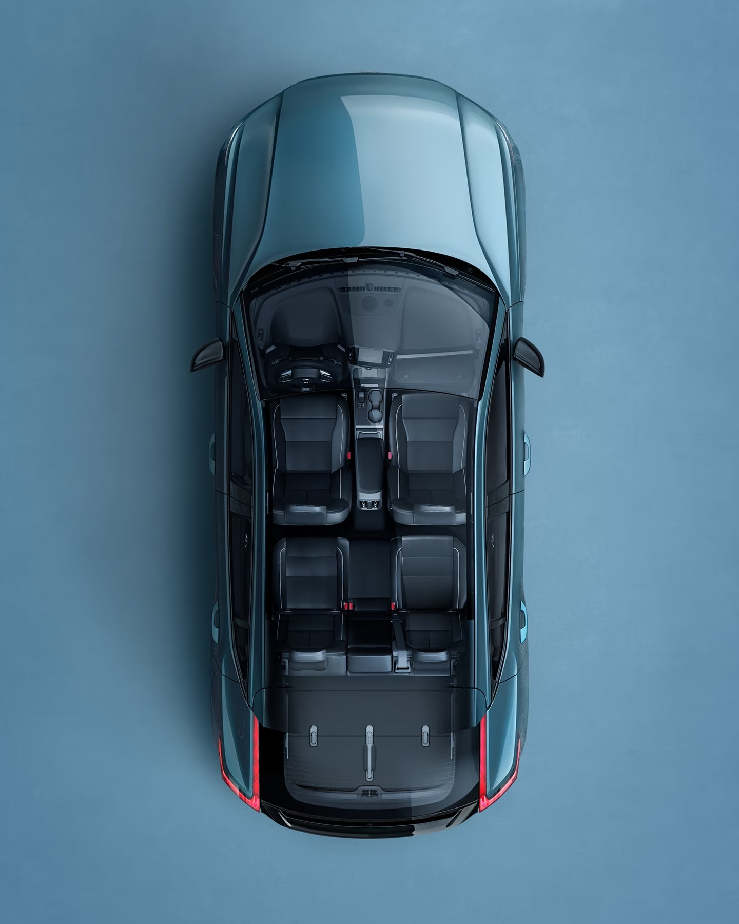 A Fjord blue Volvo C40 Recharge seen from directly above with interior visible.