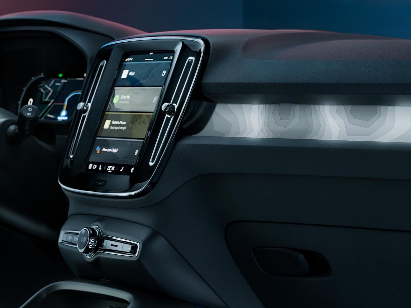 Front passenger view of center display and back-lit décor of the Volvo C40 Recharge.