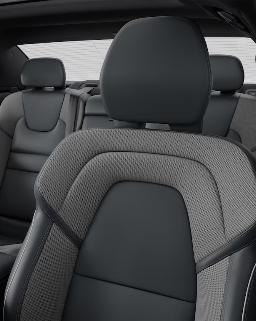 Volvo S60 mild hybrid interior with dark gray leather and textile seats.