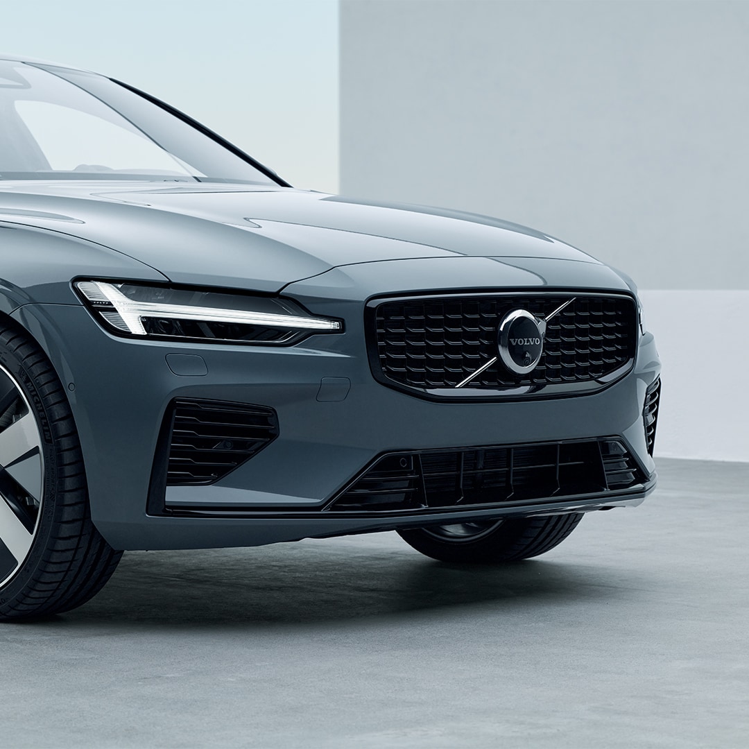 Volvo S60 Recharge plug-in hybrid LED headlamps and side exterior.