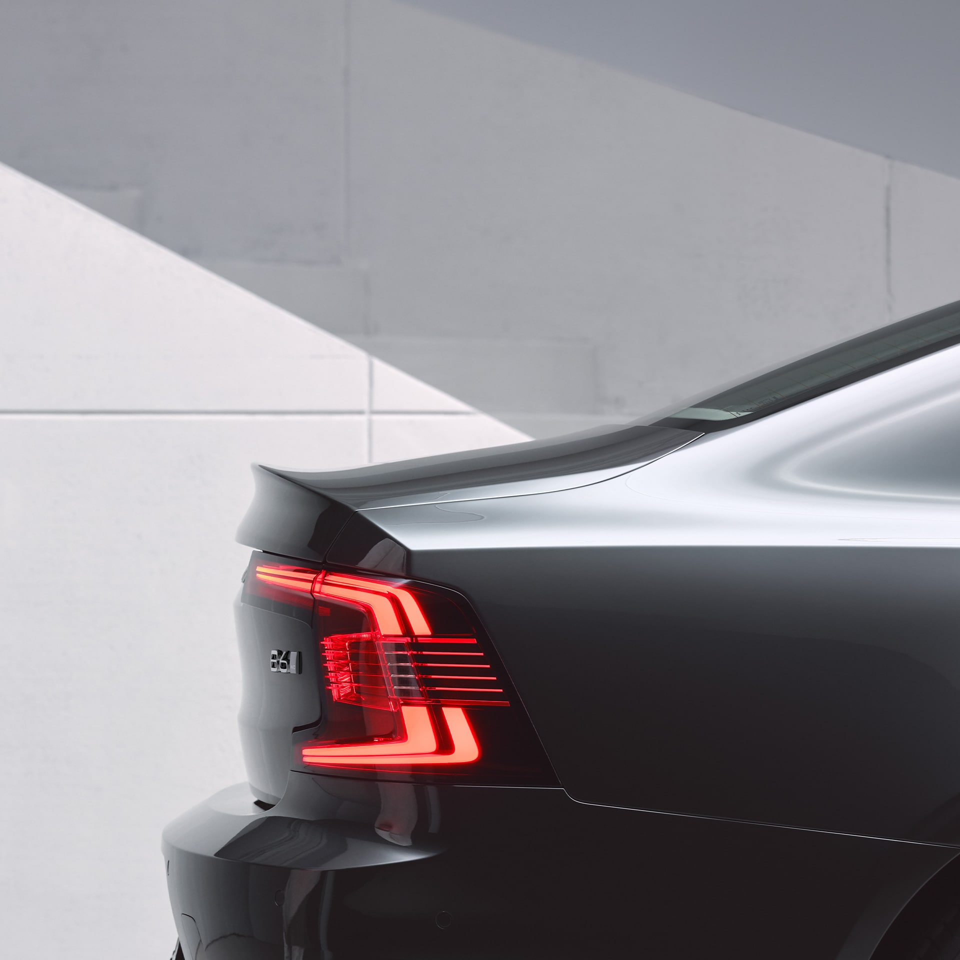 Rear view of Volvo S90 with full LED rear lamps.