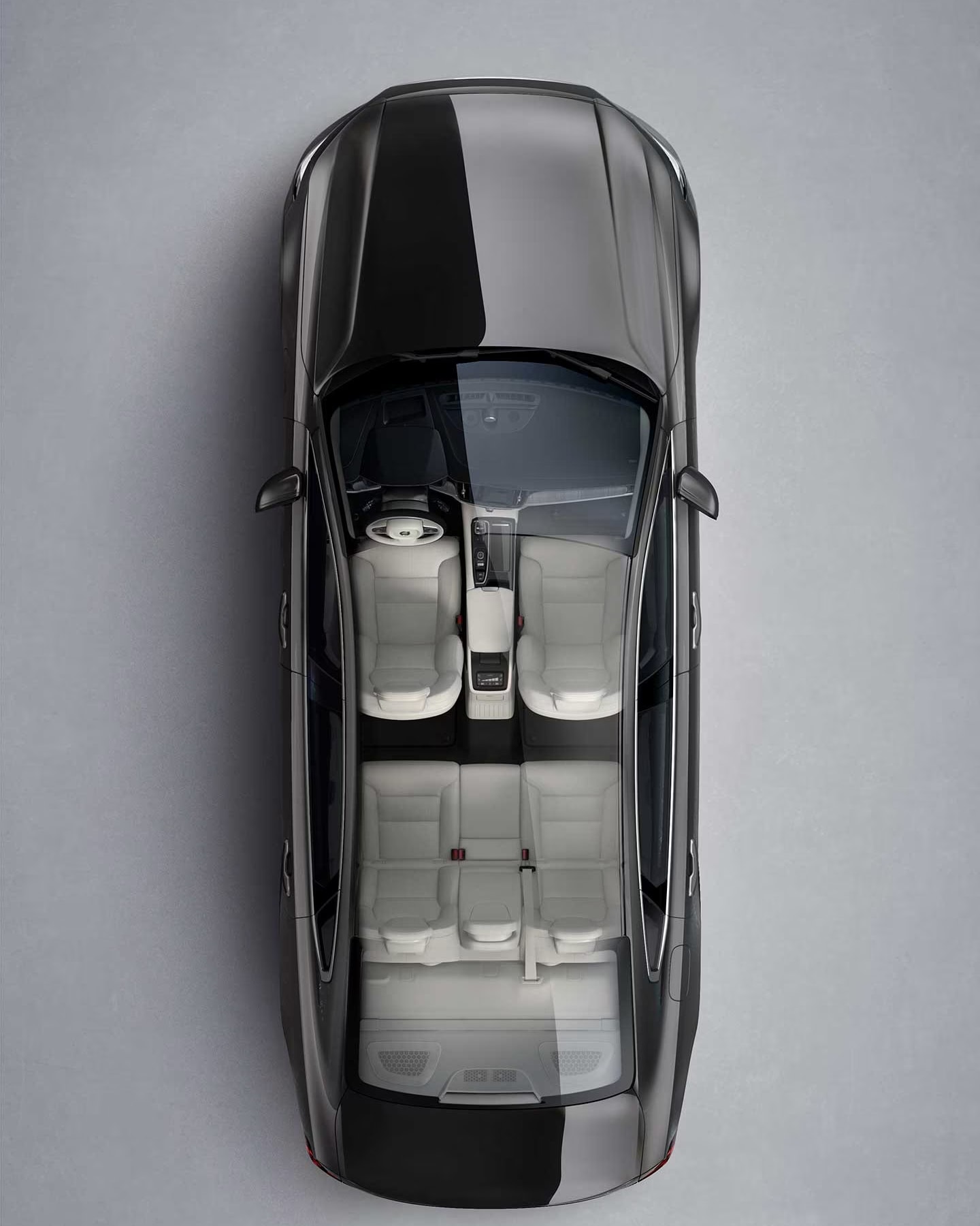 A brown Volvo S90 Recharge seen from directly above with interior visible.