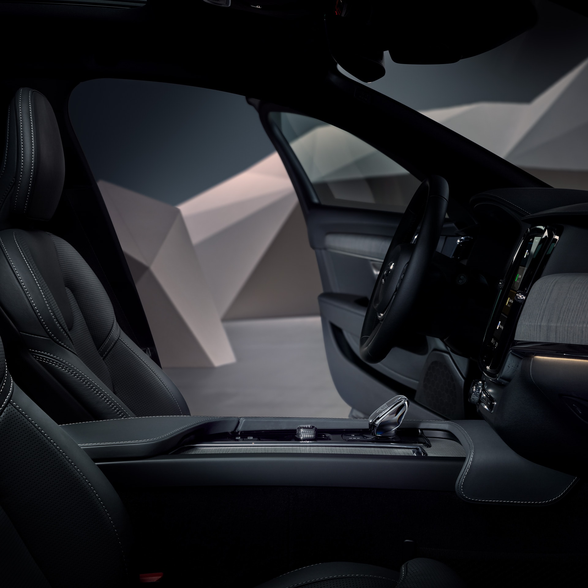 Diseño interior frontal en negro de un Volvo V90 Cross Country.
