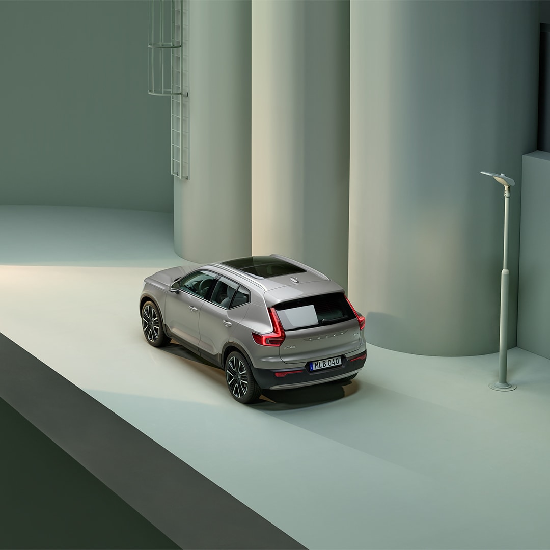 Volvo XC40 SUV seen from elevated side position.
