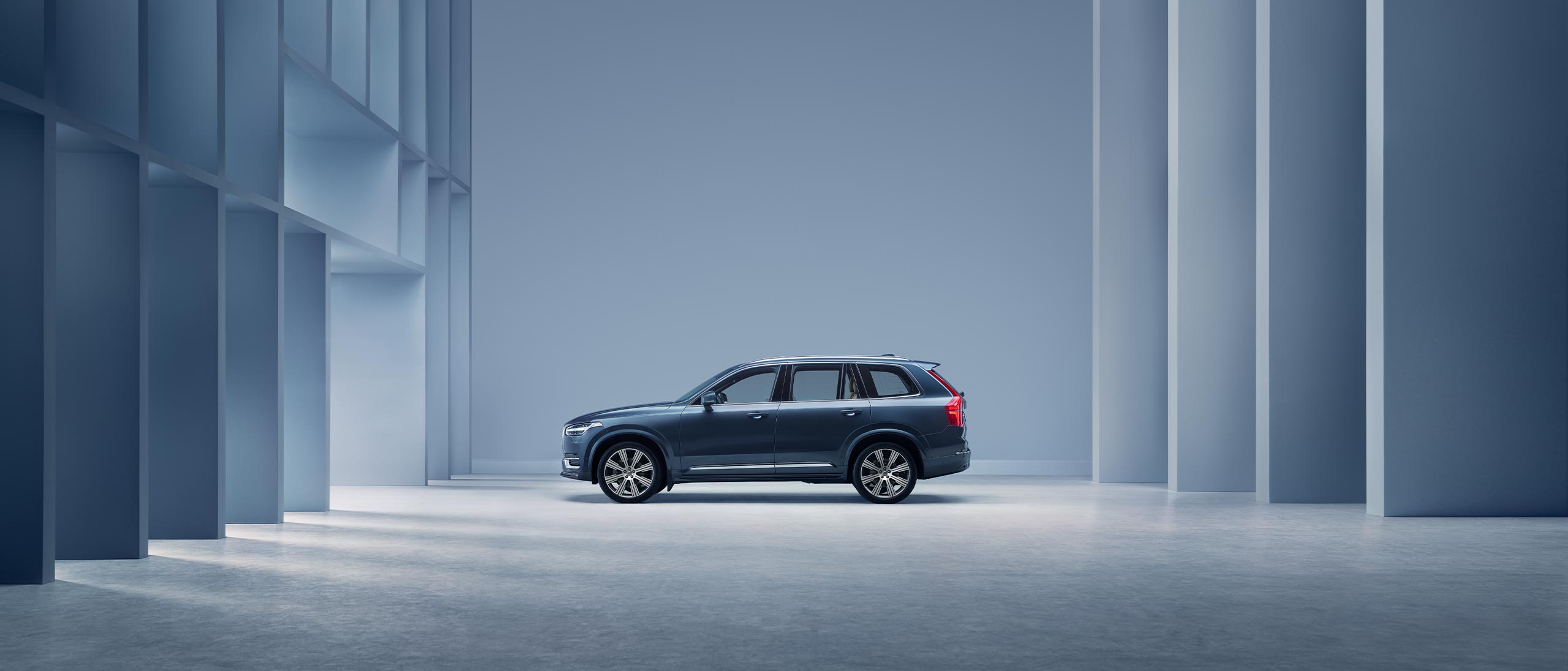 The side profile of a Volvo XC90 SUV.