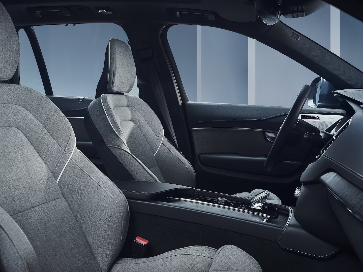 Volvo XC90 Recharge plug-in hybrid dashboard, center console and wool upholstered front seats.
