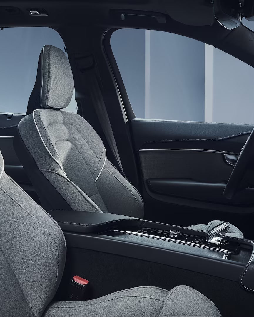 Volvo XC90 Recharge plug-in hybrid dashboard, center console and wool upholstered front seats.