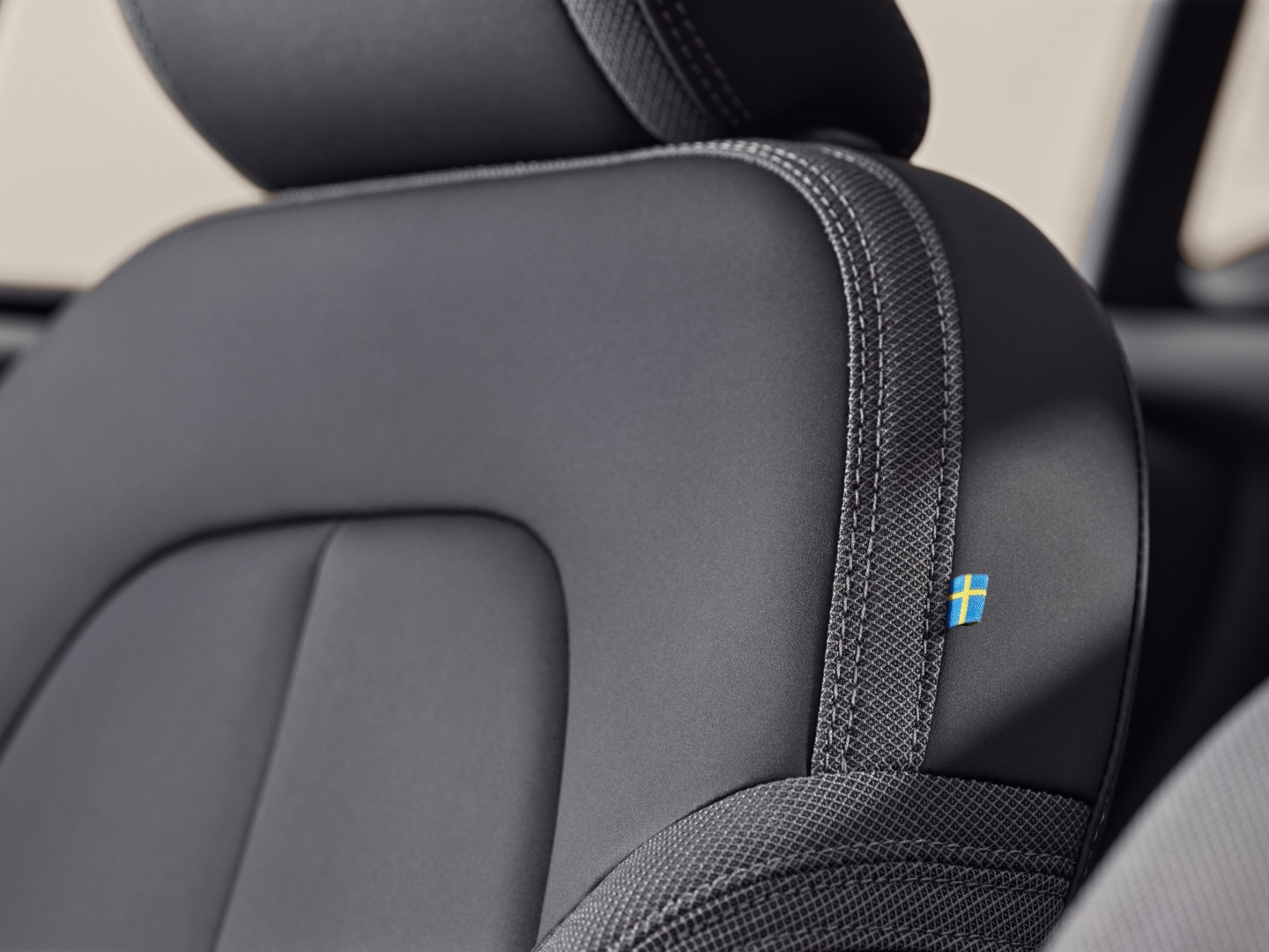 Fine stitching on the premium wool upholstery available in the Volvo EX40.