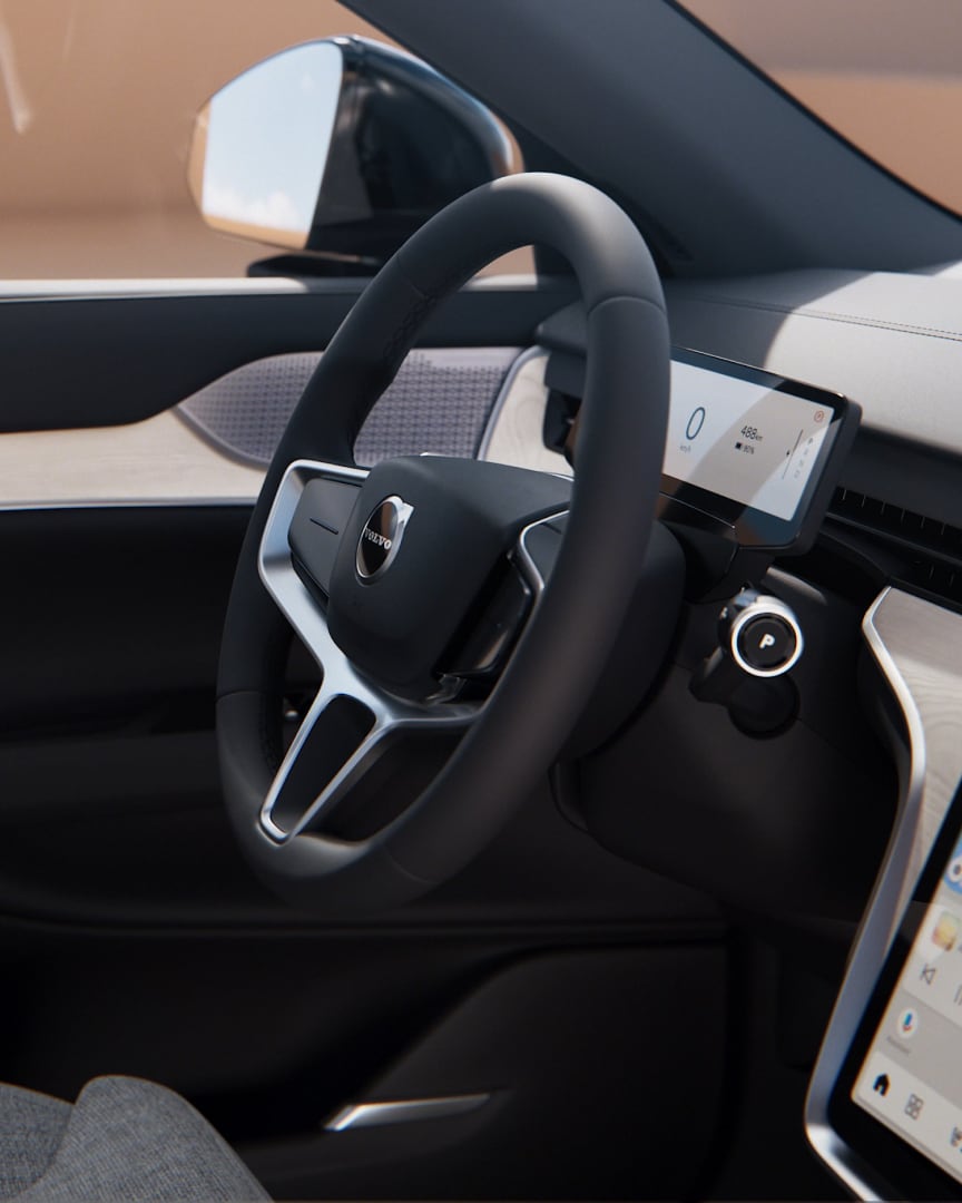 The steering wheel and free-floating centre display in a Volvo EX90.