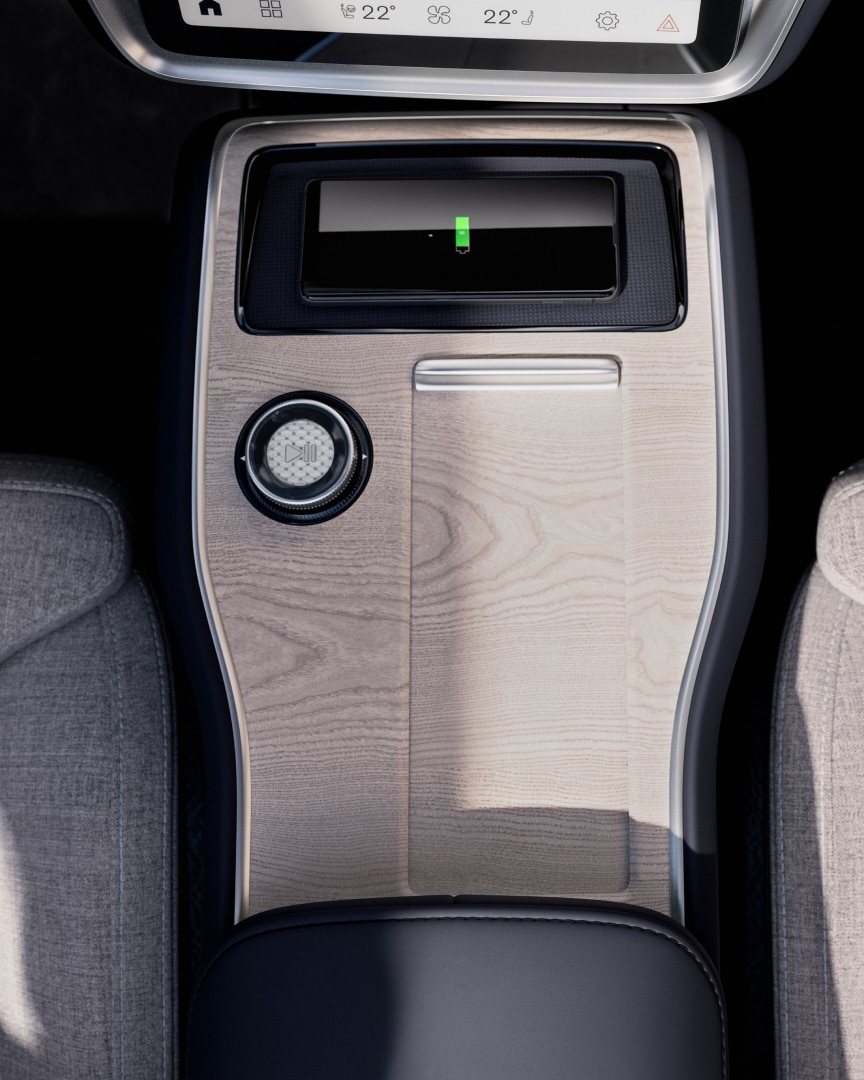 The wireless phone charging storage in a Volvo EX90 from above.