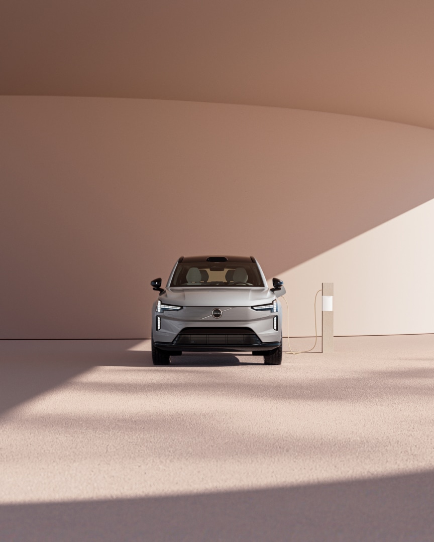 Volvo EX90 fully electric SUV charging.