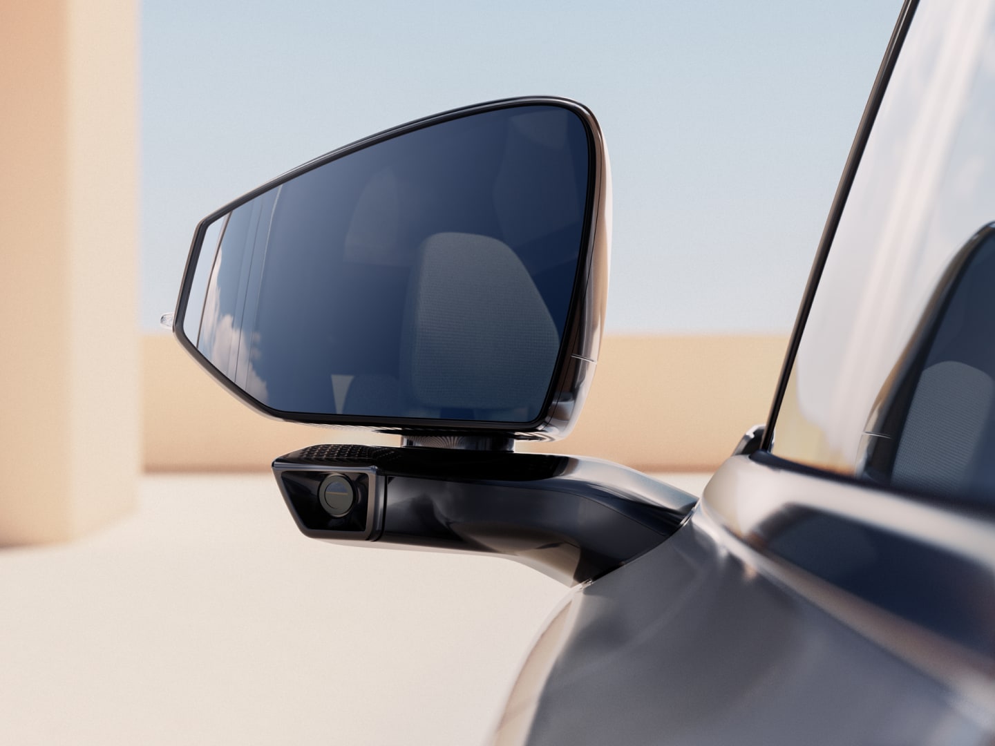 Primo piano dello specchietto esterno senza cornice di una Volvo EX90.