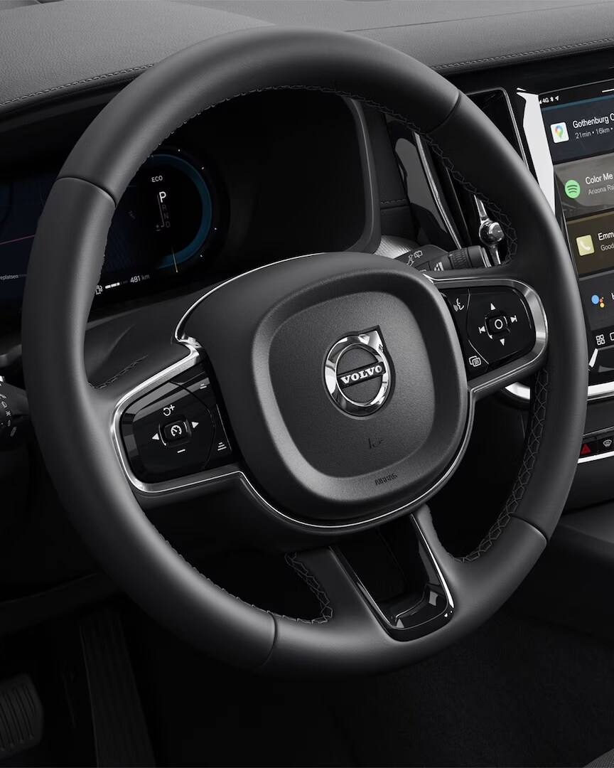 The Volvo S60 mild hybrid’s steering wheel, instrument panel, centre console and infotainment touchscreen.