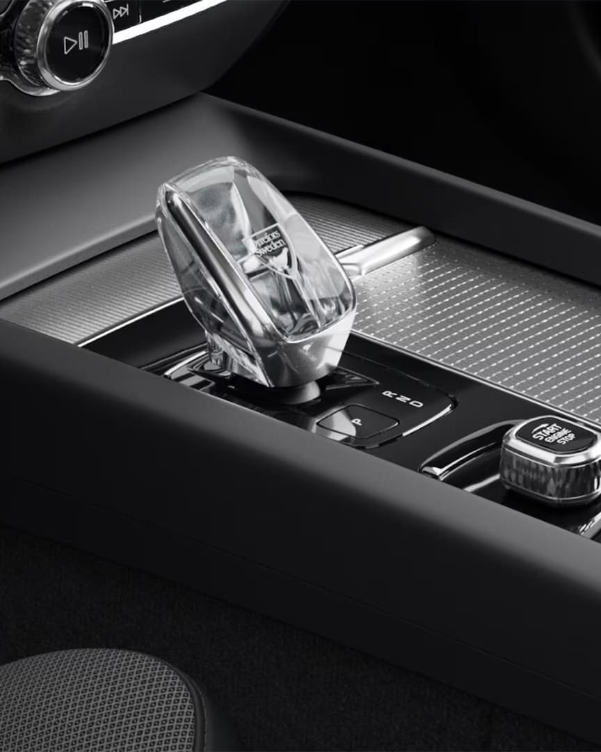 Start button and crystal gear shifter in the metal mesh-trimmed centre console of the Volvo S60 mild hybrid.