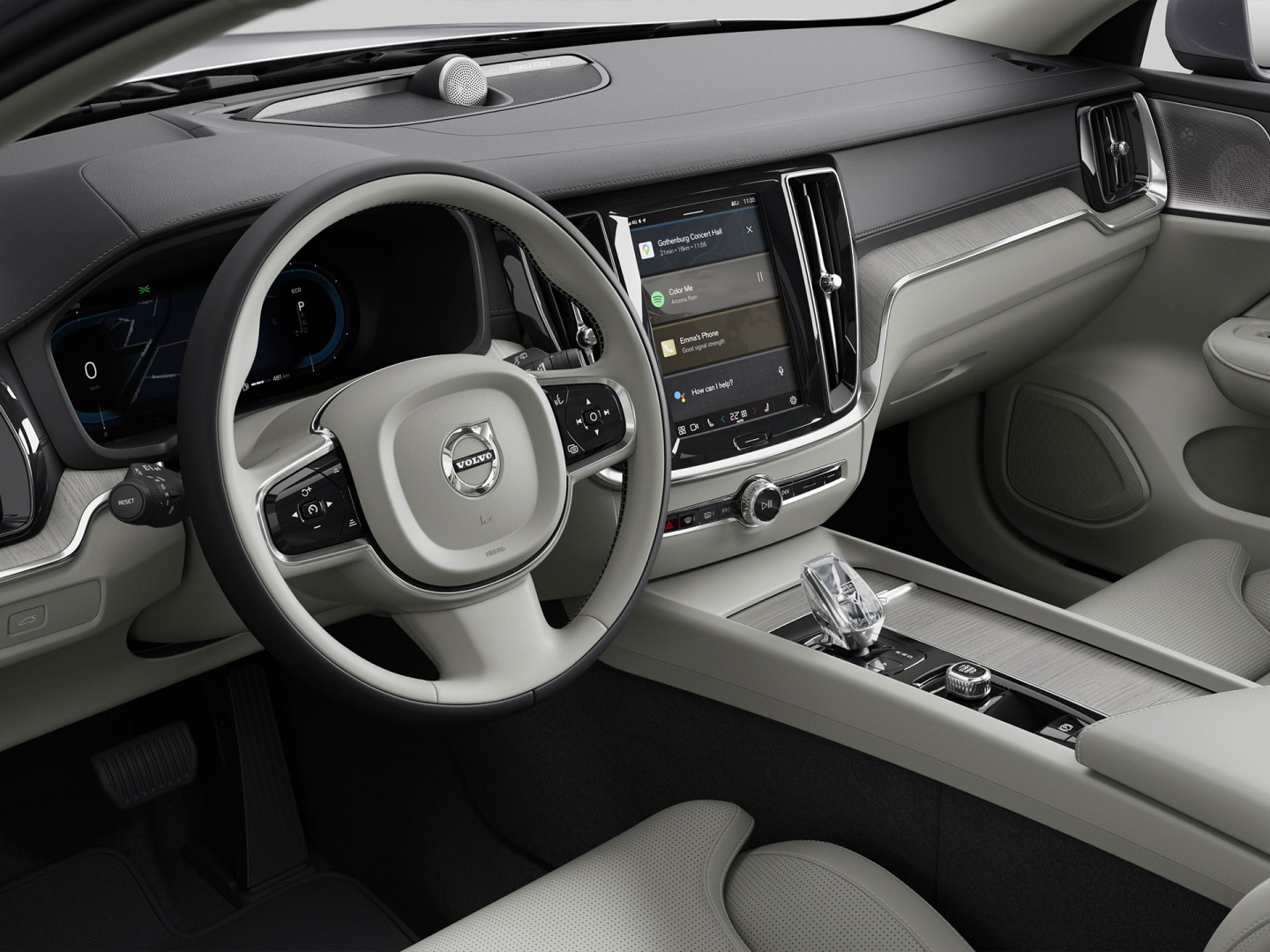 Zicht vanaf de passagierskant op het stuurwiel, het dashboard, de ventilatieroosters en het infotainmentaanraakscherm van de Volvo V60 mild hybrid.