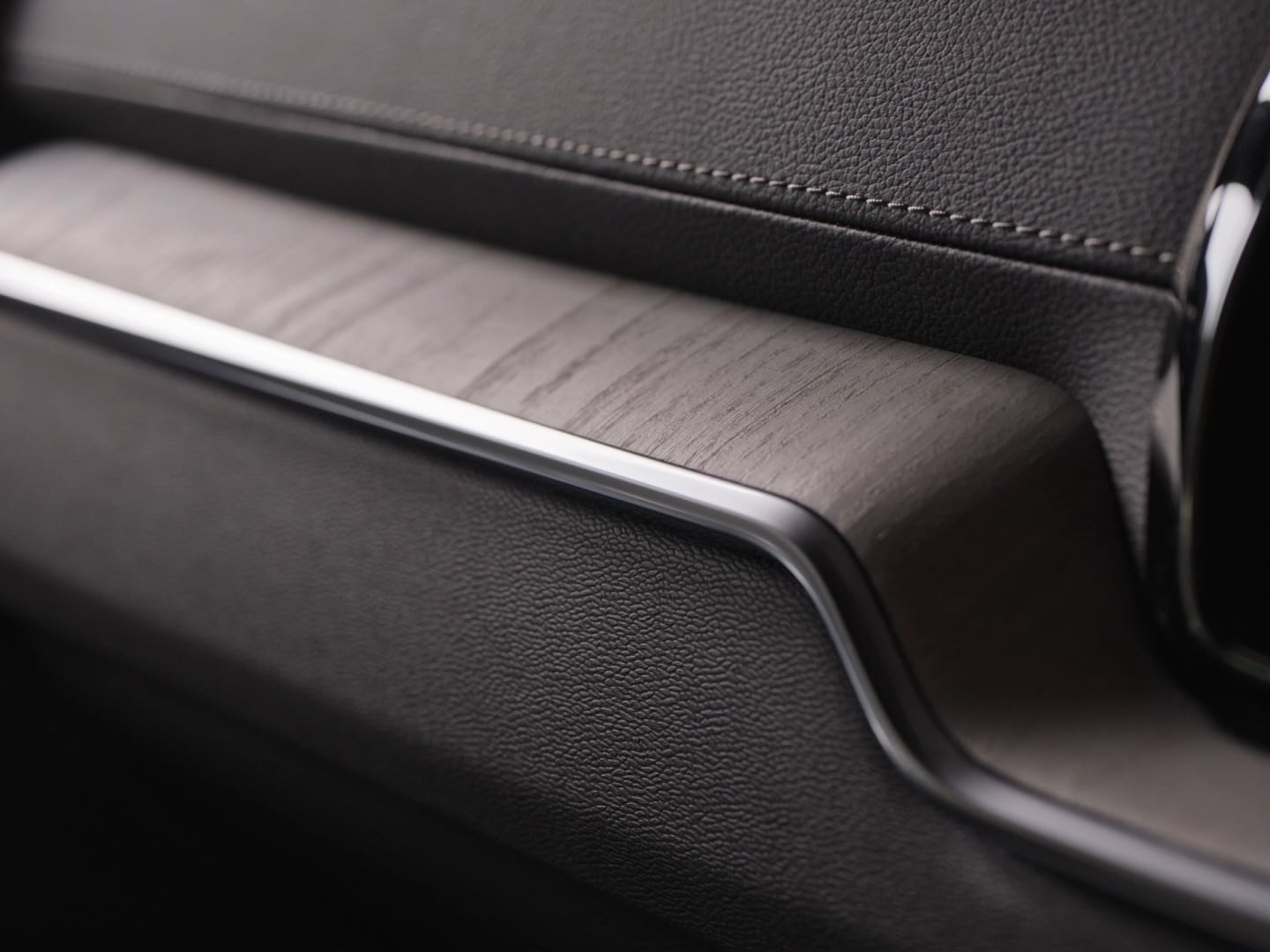 Close-up of the real wood trim in a Volvo V60 plug-in hybrid.