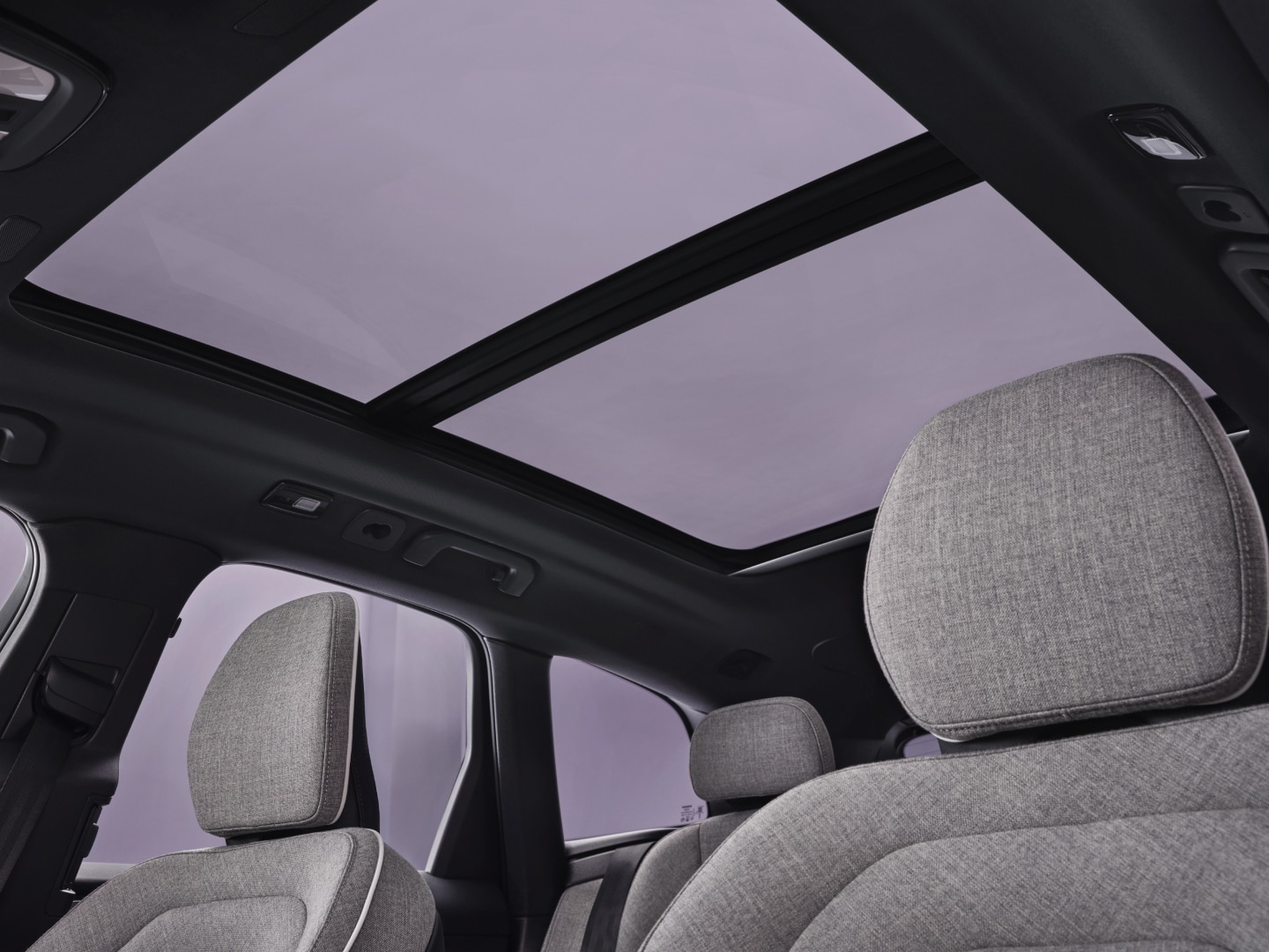 Interior view of the panoramic roof of a Volvo XC60 plug-in hybrid.
