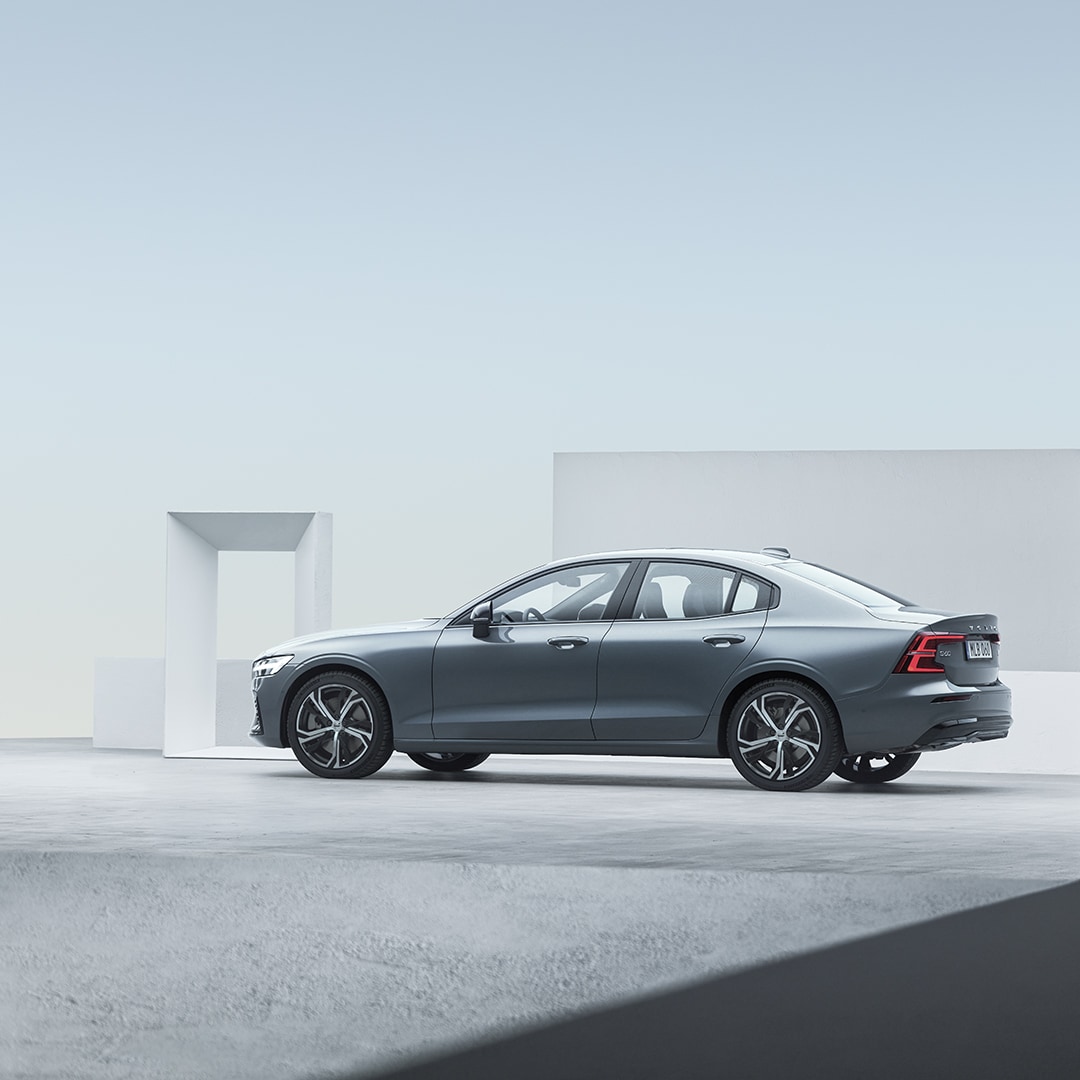 Volvo S60 sedan with driver assistance technology and all-wheel drive. 