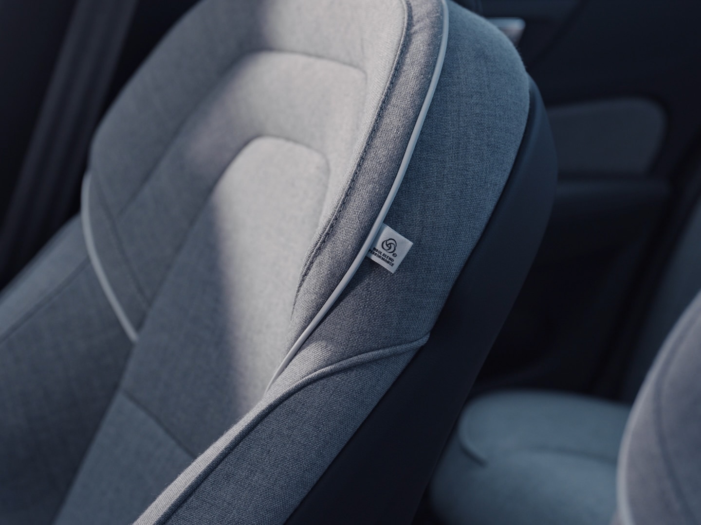 Interior close-up of the leather free Tailored Wool Blend seats in a Volvo S60 Recharge.