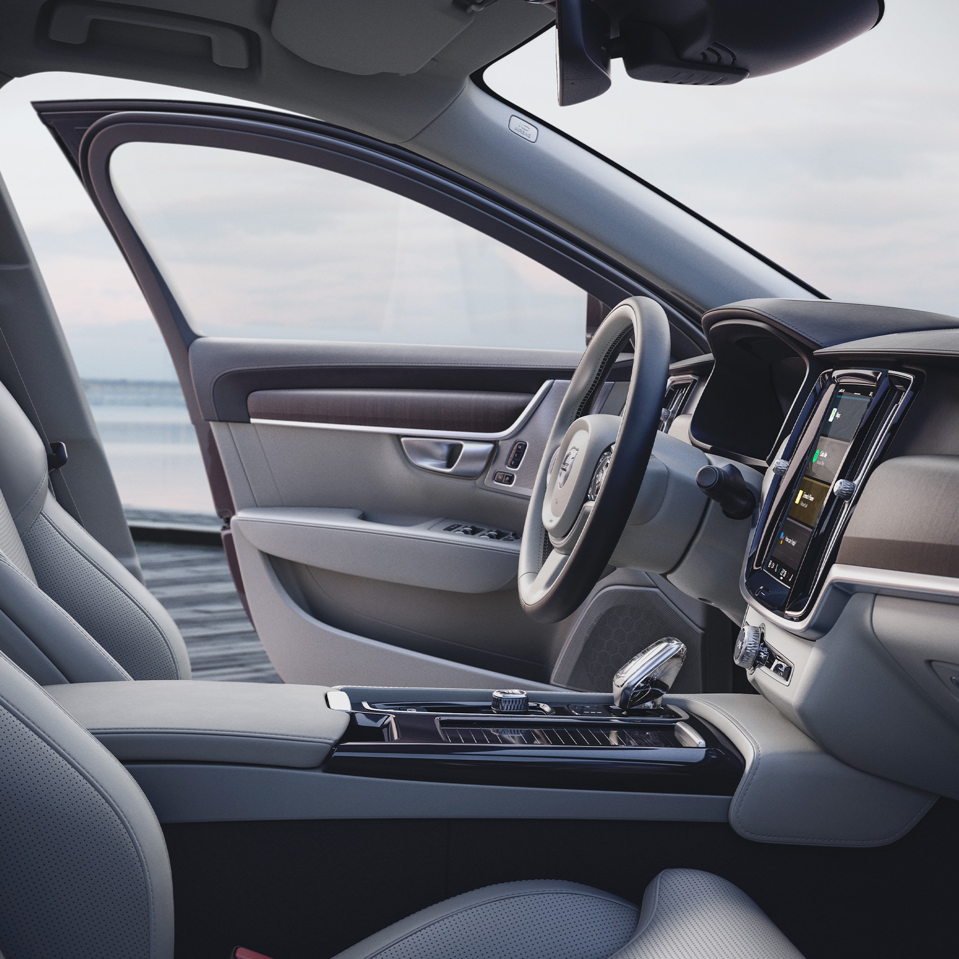 Inside of a Volvo S90 with light interior.