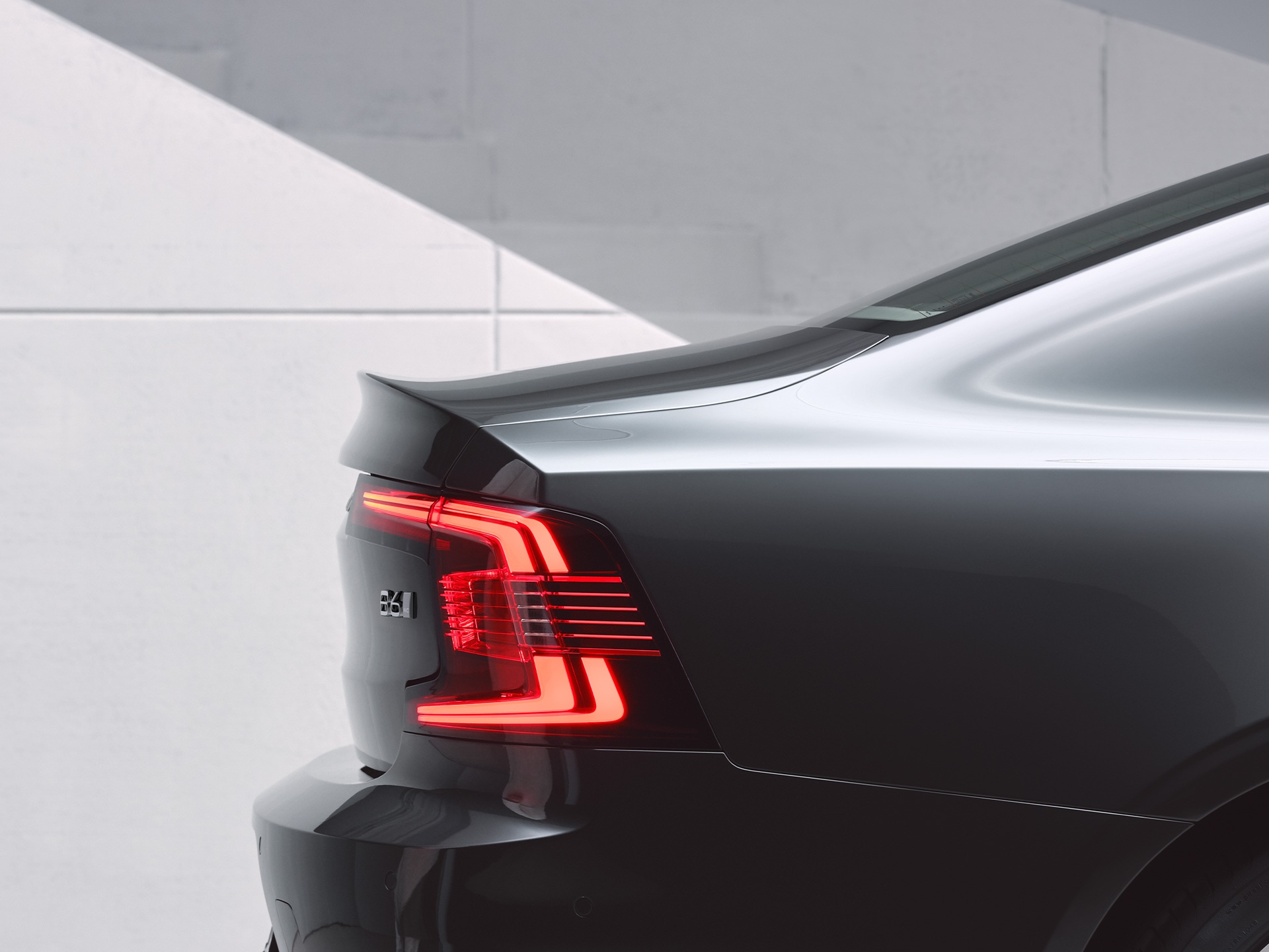 Rear view of Volvo S90 with full LED rear lamps.