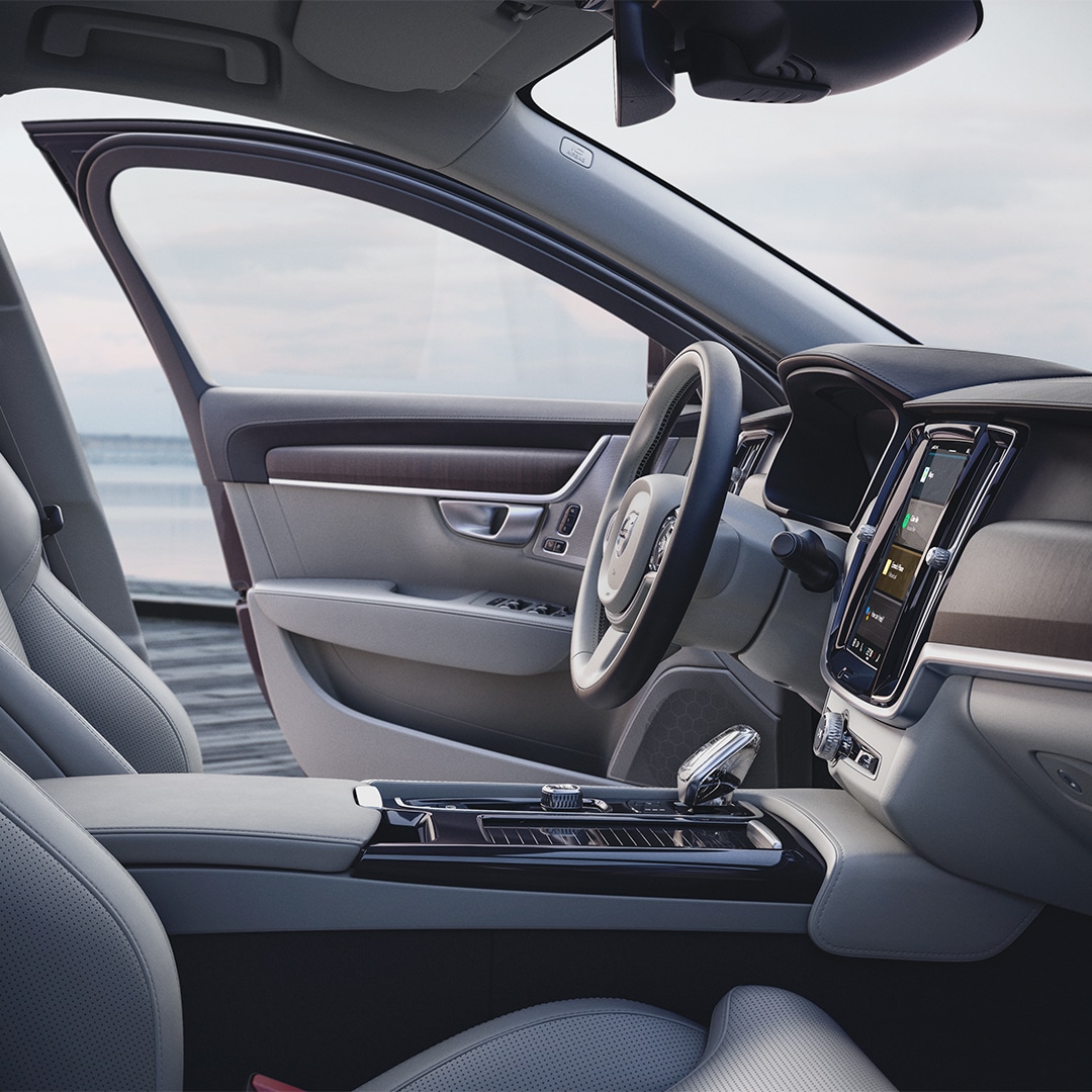 Interior drivers position in Volvo S90 Recharge seen from passenger position.